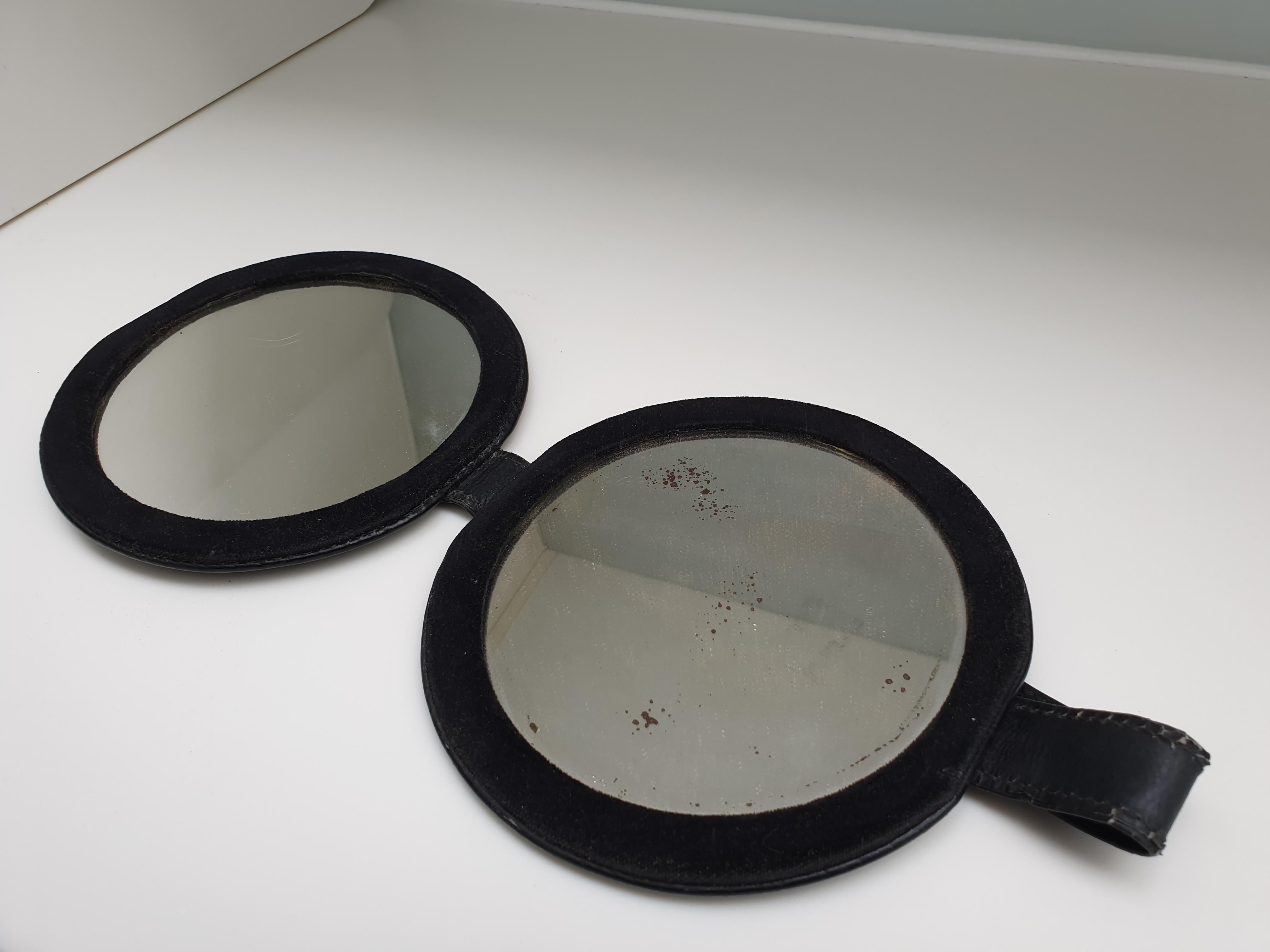 Mid Century stitched eather travel mirror in the manner of Jacques Adnet In Fair Condition For Sale In London, GB