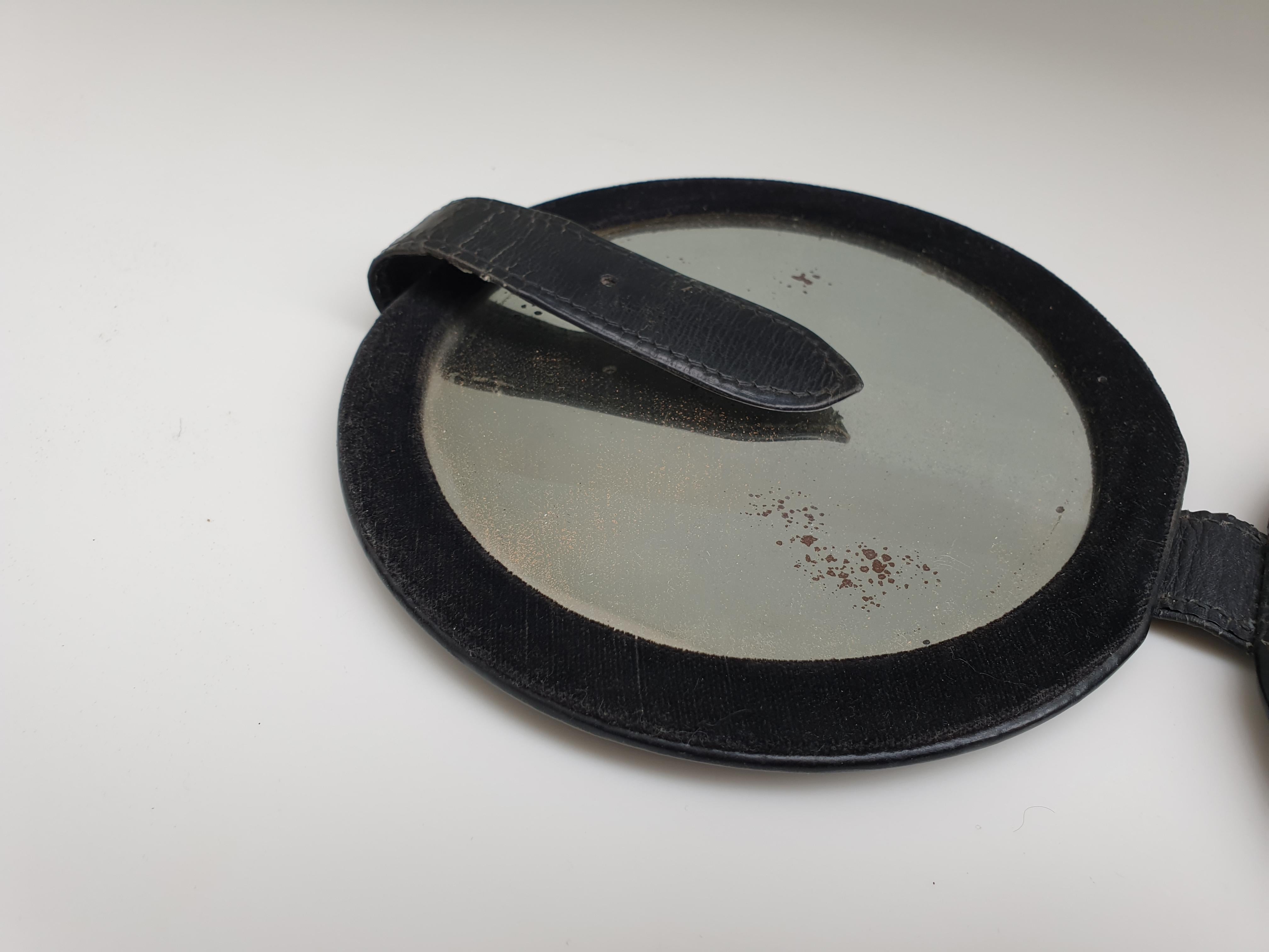Leather Mid Century stitched eather travel mirror in the manner of Jacques Adnet For Sale