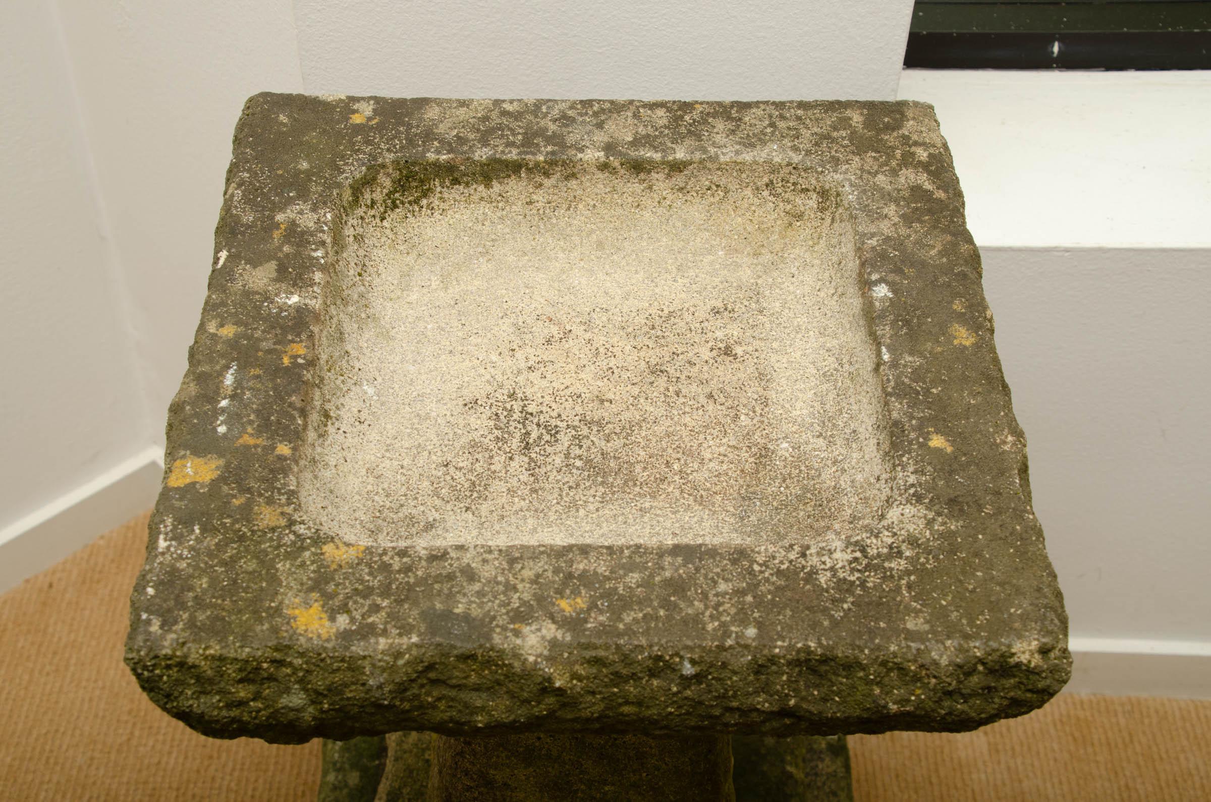 antique stone birdbath