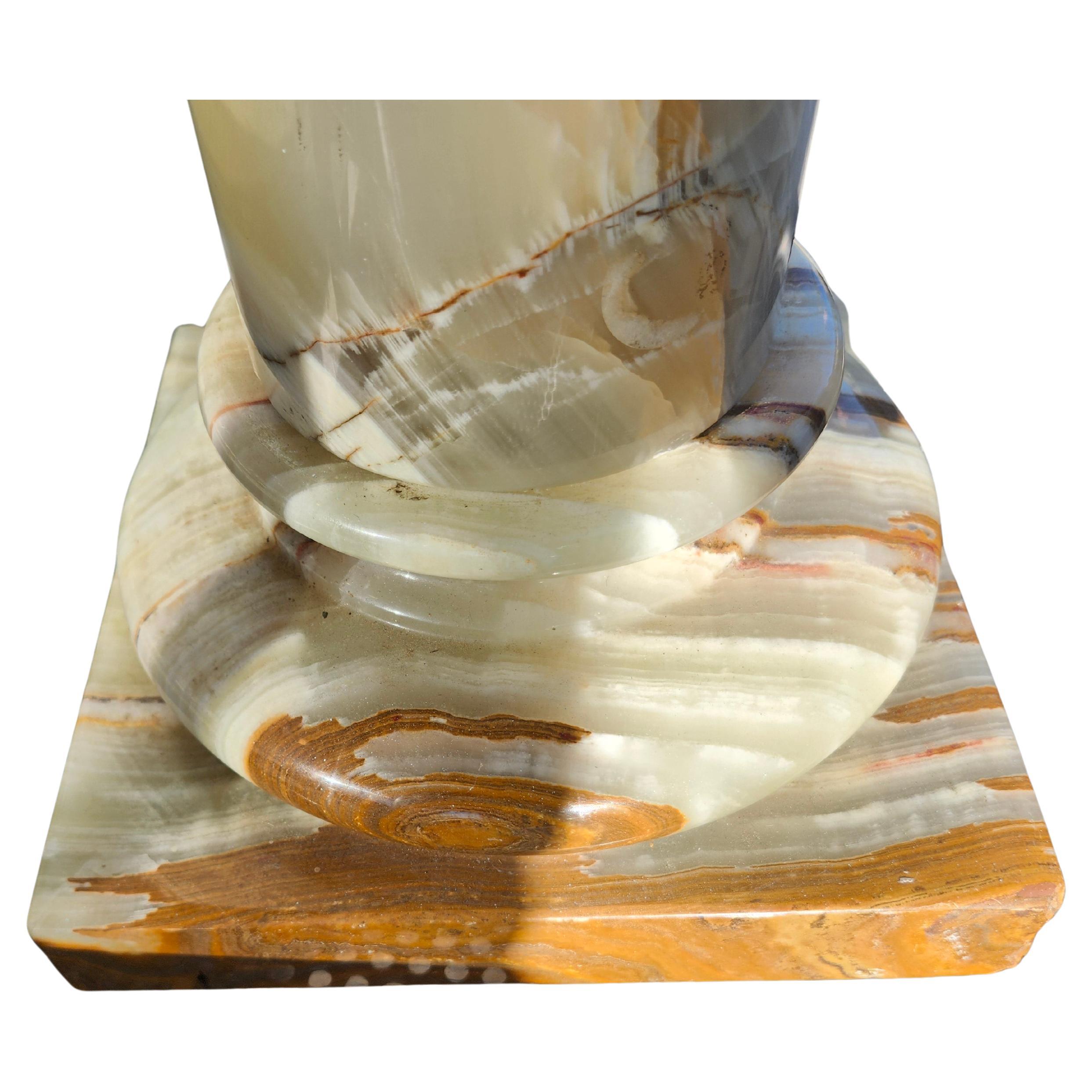 Petite Onyx stone 3 part pedestal. Base platform and the cylinder comprise the pedestal. Fantastic graining throughout.
Minor chips . Please see all pics and the video as that is part of the description.
