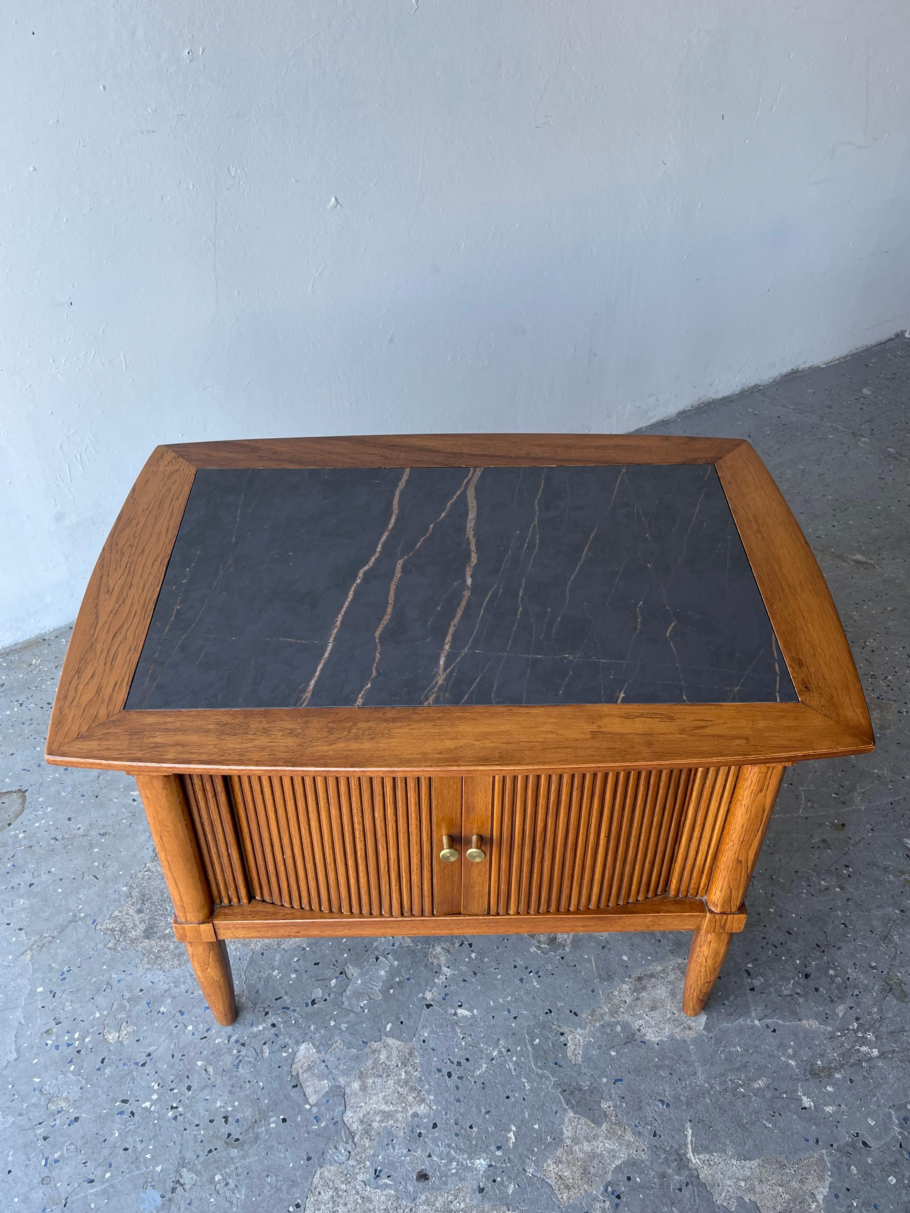 Pair Mid Century of stone toped sophisticate by tomlinson end tables or nightstands



This is a set of Sophisticate by Tomlinson Mid-Century End Tables that are made from pecan wood. They include open cabinets with tambour doors, brass knobs