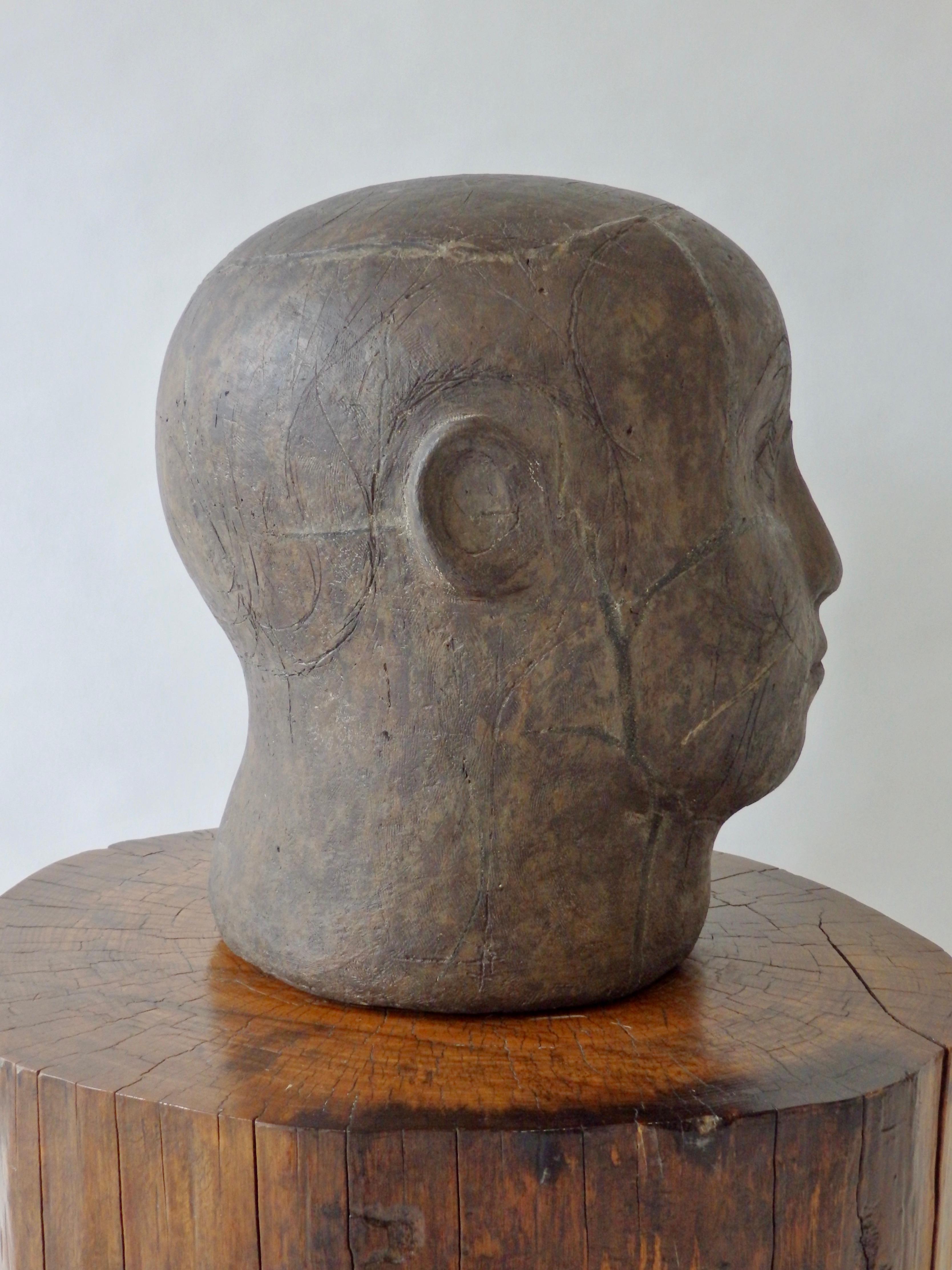 Folky stoneware sculpture of male bust. Incised mark OM 58. Believed to be O.M. Tannenbaum 1958. Hollow body still heavy.