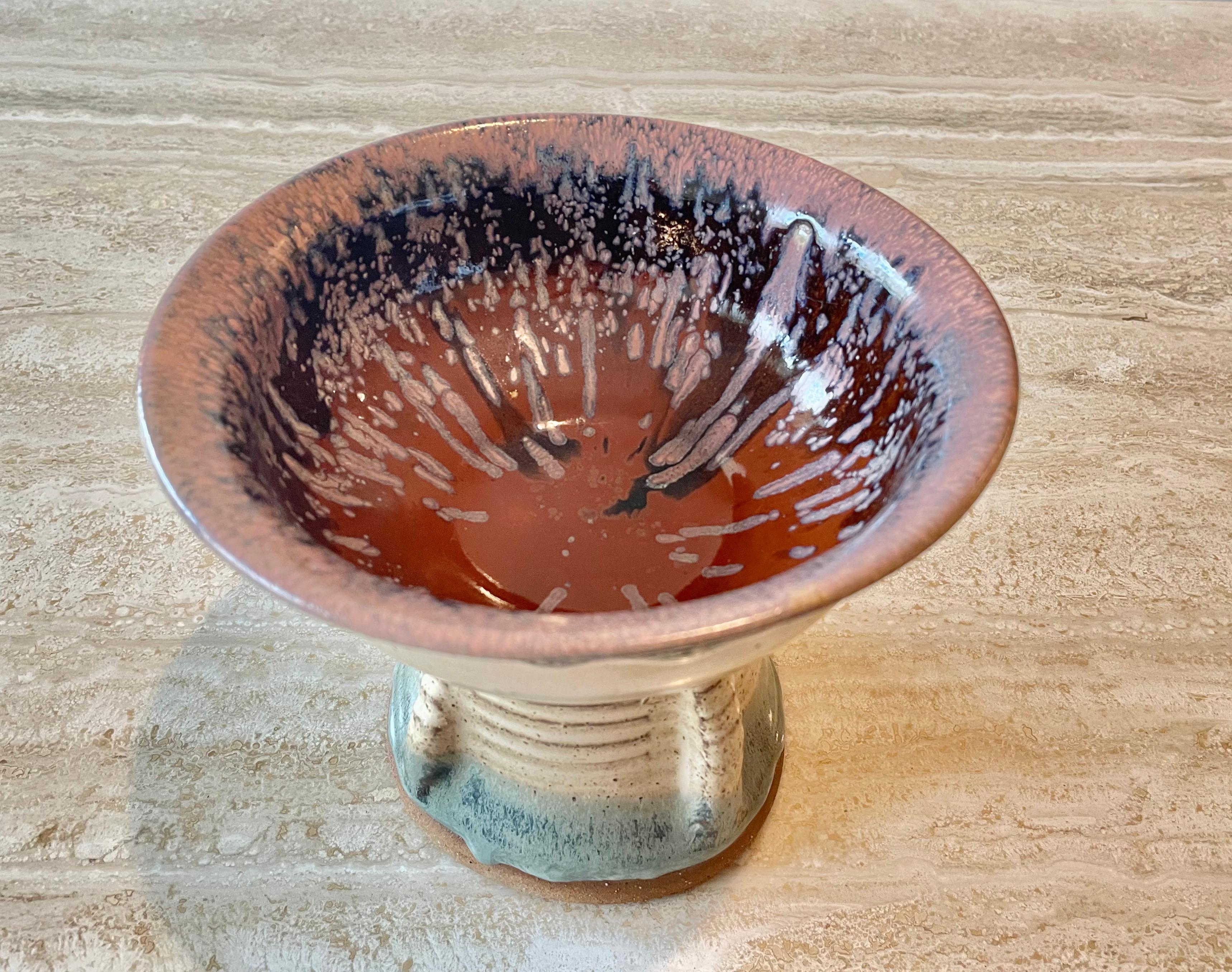 Midcentury stoneware splatter bowl. Perfect for keys or candy on an entry way table. Unknown signature on the bottom.