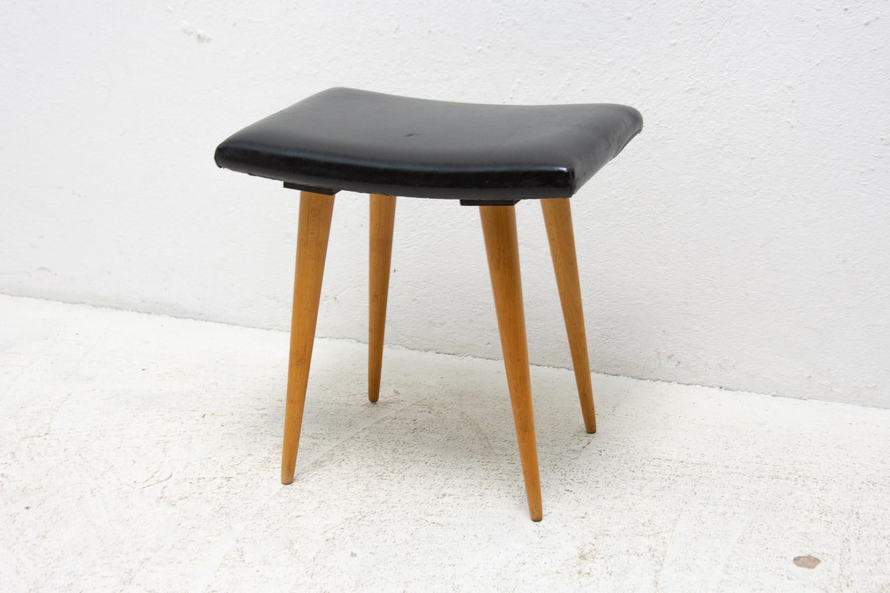 This stool/footrest was made by Západoslovenské nábytkárské Závody in the former Czechoslovakia in the 1970´s. It has leatherette seat and the structure is made of beech wood. In good Vintage condition.

Height: 42 cm

width: 41 cm

depth: 30
