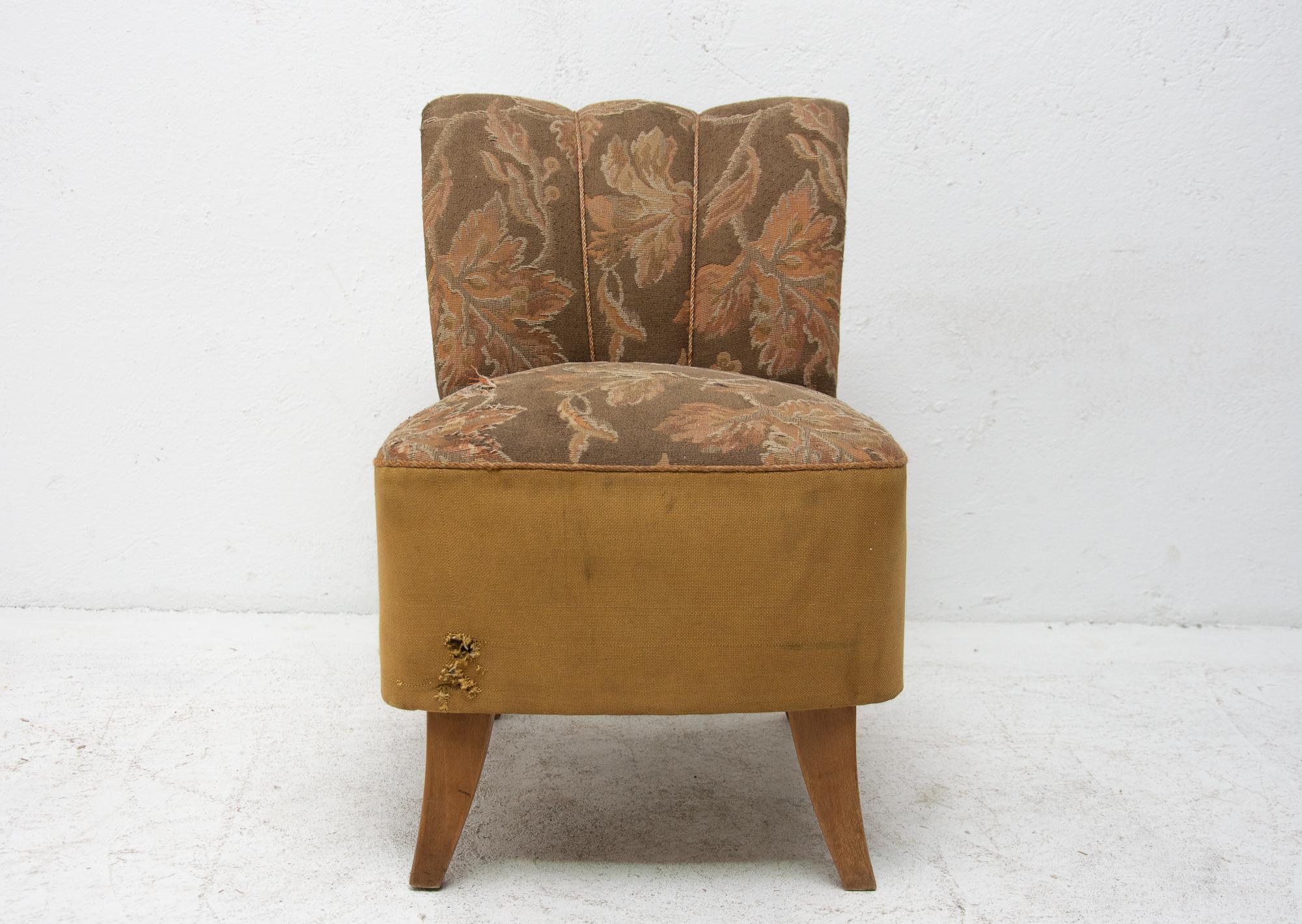 An outstanding Art Deco pouffe- footstool from the 1950s. It was made in Up Závody company. A very comfortable retro chic. Also can be used as a chair. The stool bears signs of age and using, new upholstery would be needed. In case of interest we