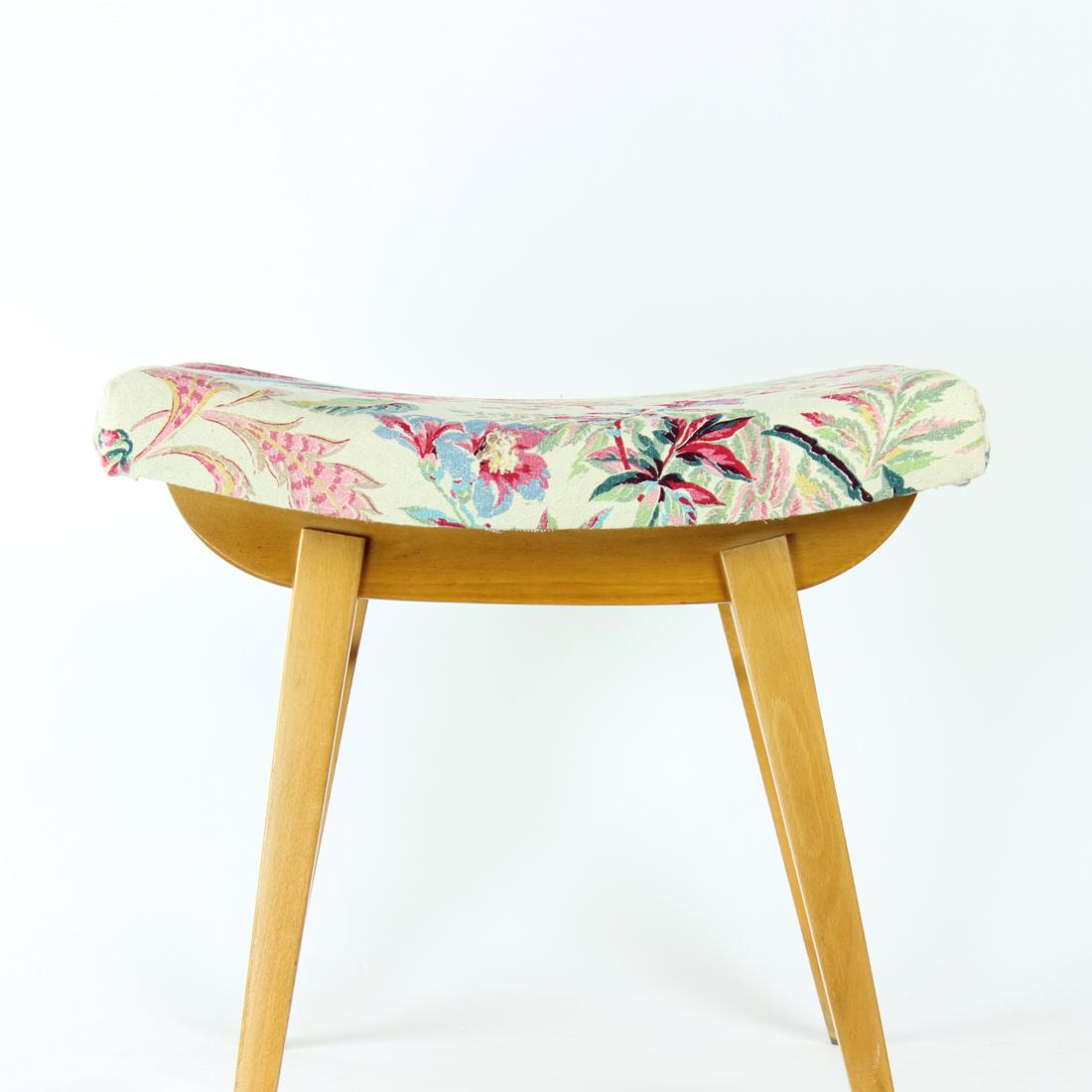Beautiful and original mid-century foot stool produced in 1960s by TON company. Fully restored with refinished and restored wooden base. It is made of oak wood and full of beautiful details. The seat with new cushion and upholstery in an original