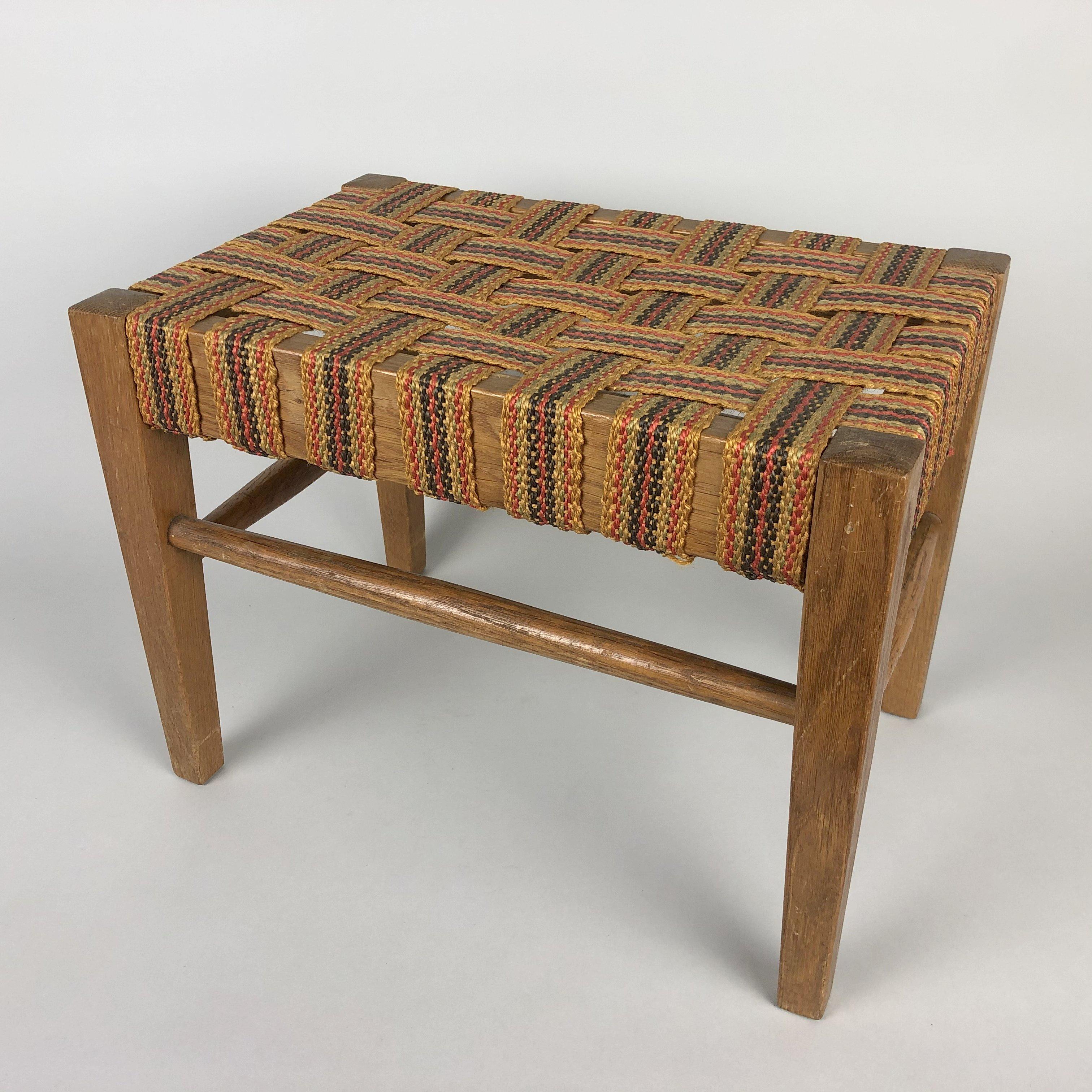 Midcentury small stool made of wood and fabric. Original well preserved condition.