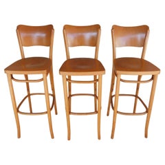 Tabourets en bois cintré du milieu du siècle attribués à Thonet - Lot de 3