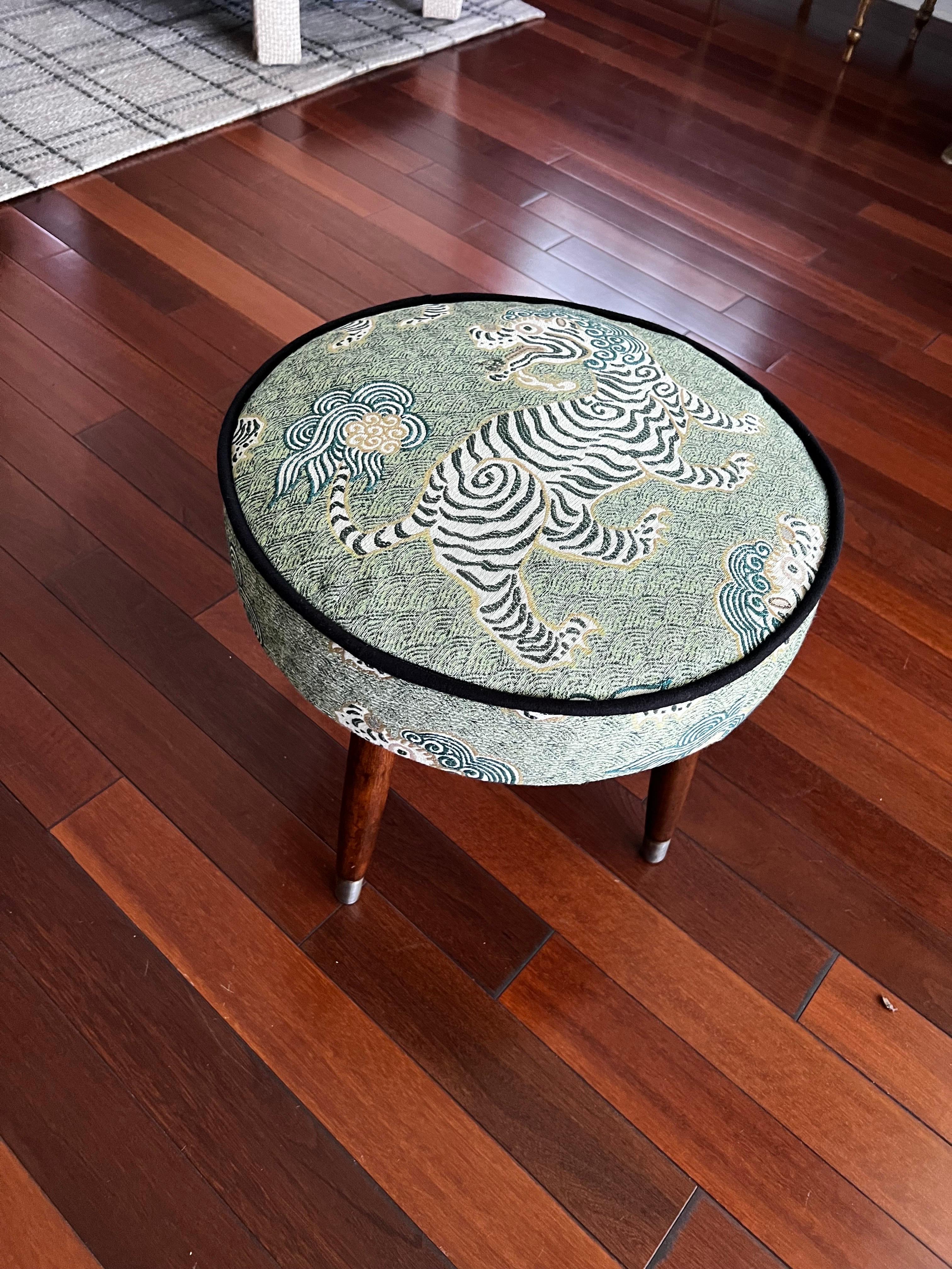 Stunning pair of vintage mid-century stools that have been refinished and reupholstered with a gorgeous Tibet fabric in Green color, black welting gives the perfect contrast and makes this pair so perfect !