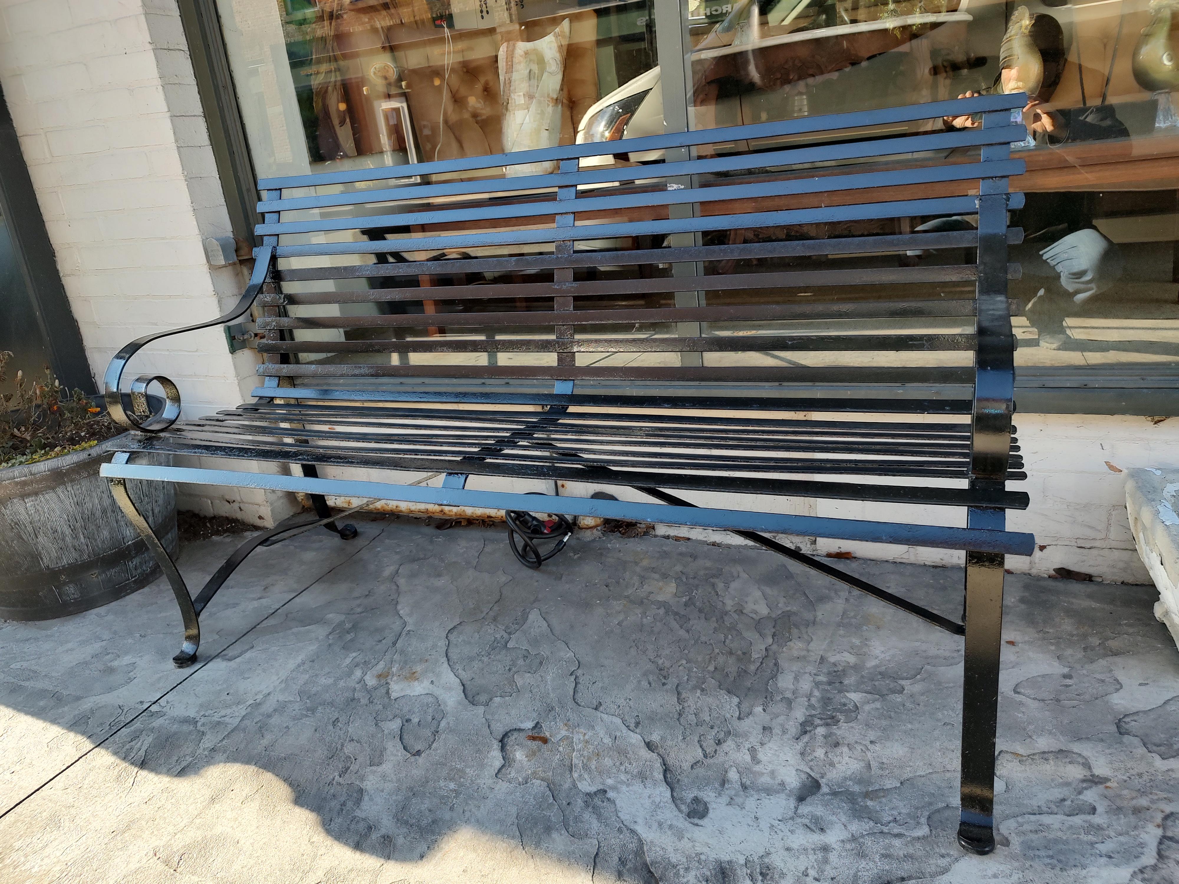 Simple and elegant strap iron 5 ft. garden park Bench. In excellent vintage condition with minimal wear. Was recently painted black and is ready for your garden, porch or hallway. Plastic glides installed for ease and protection of wood floors. Very