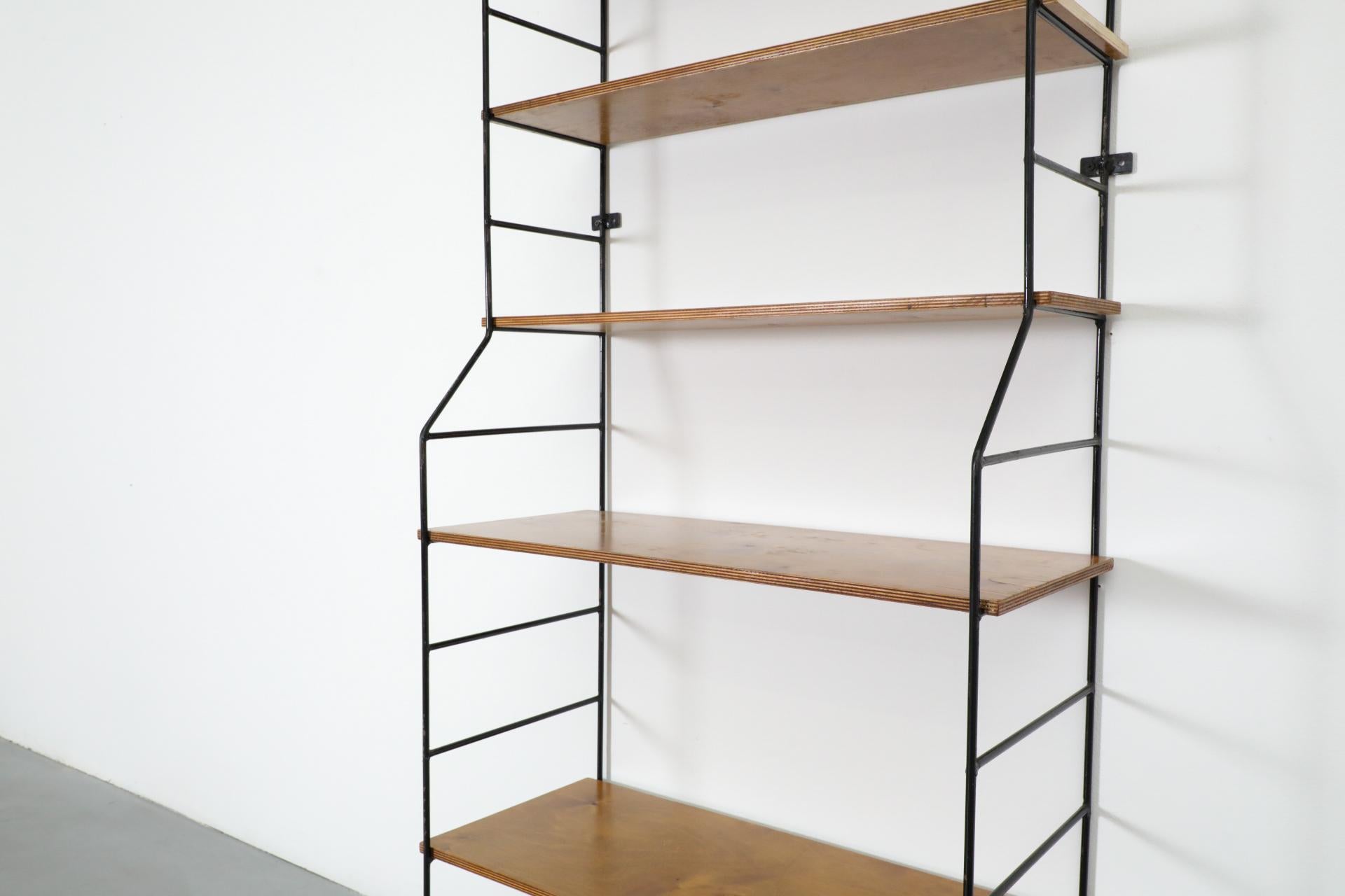 Mid-Century String Style Footed Wall Mount Shelving Unit In Good Condition In Los Angeles, CA