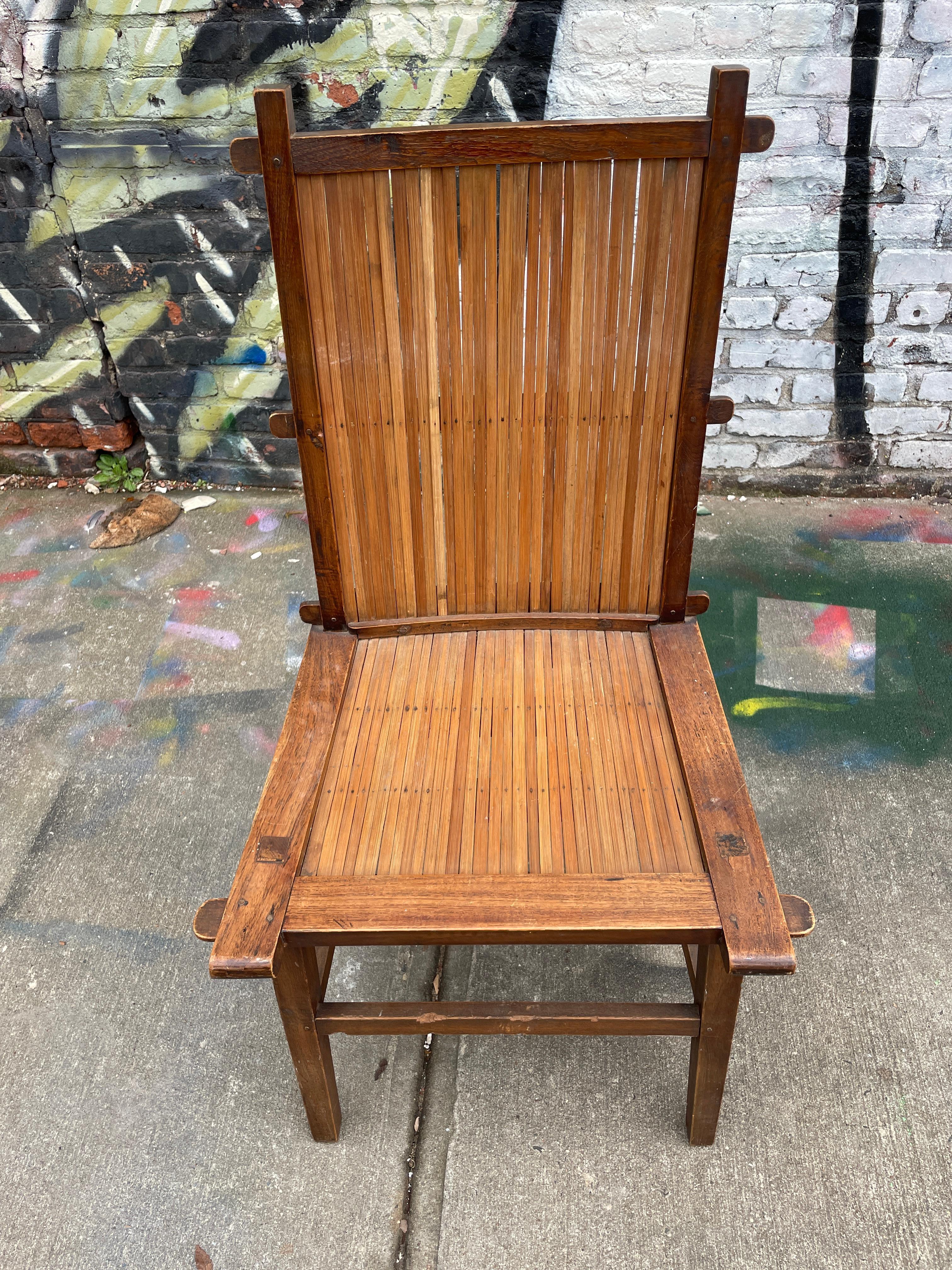 Mid century studio craft Japanese hand made chair slatted reed wood seat and seat back. Mostly all Japanese joints and nails. Magnificent patina. Very sturdy. Located in Brooklyn NYC.