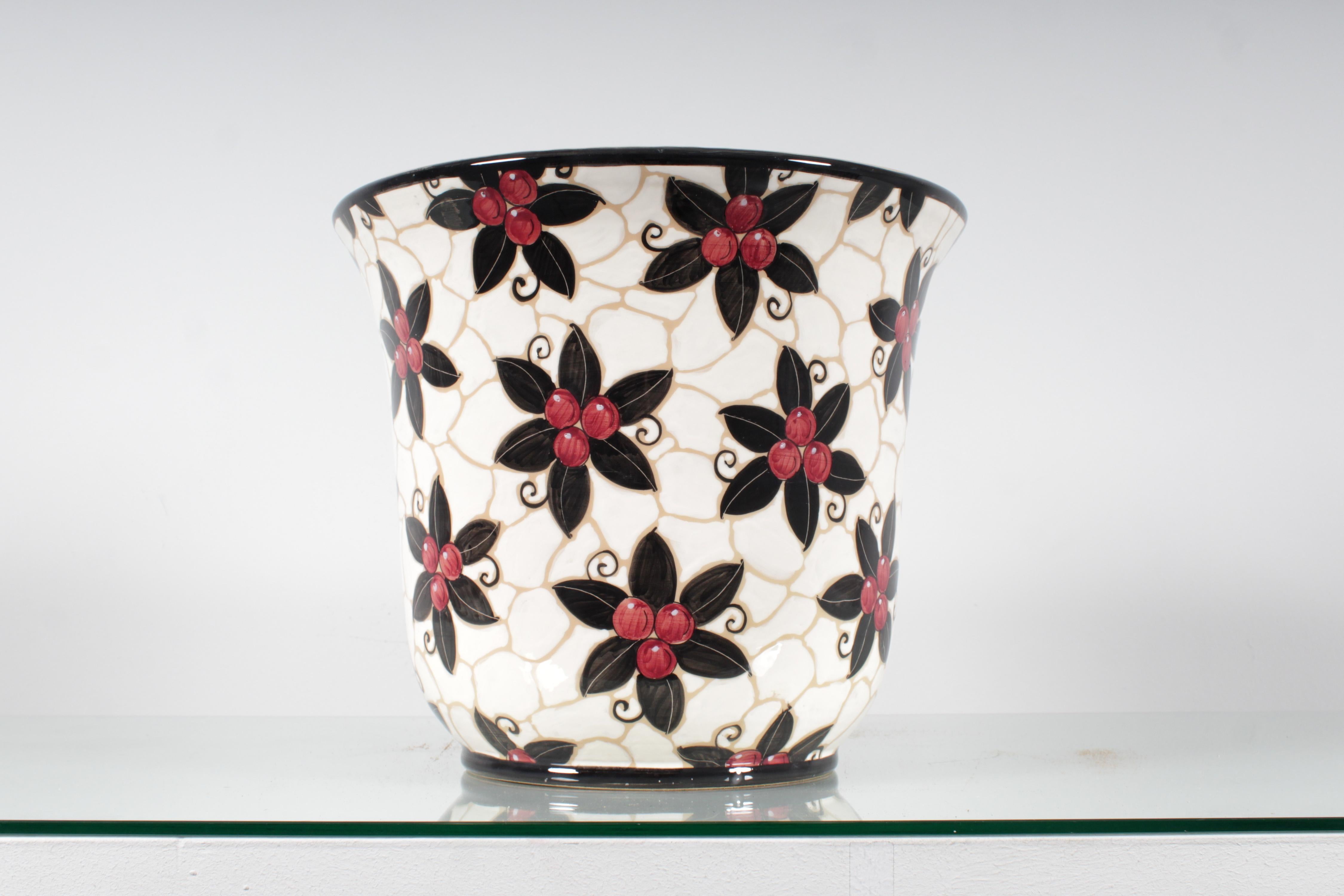 Beautiful ceramic cachepot with hand-glazed floral decoration, signed on the bottom by 