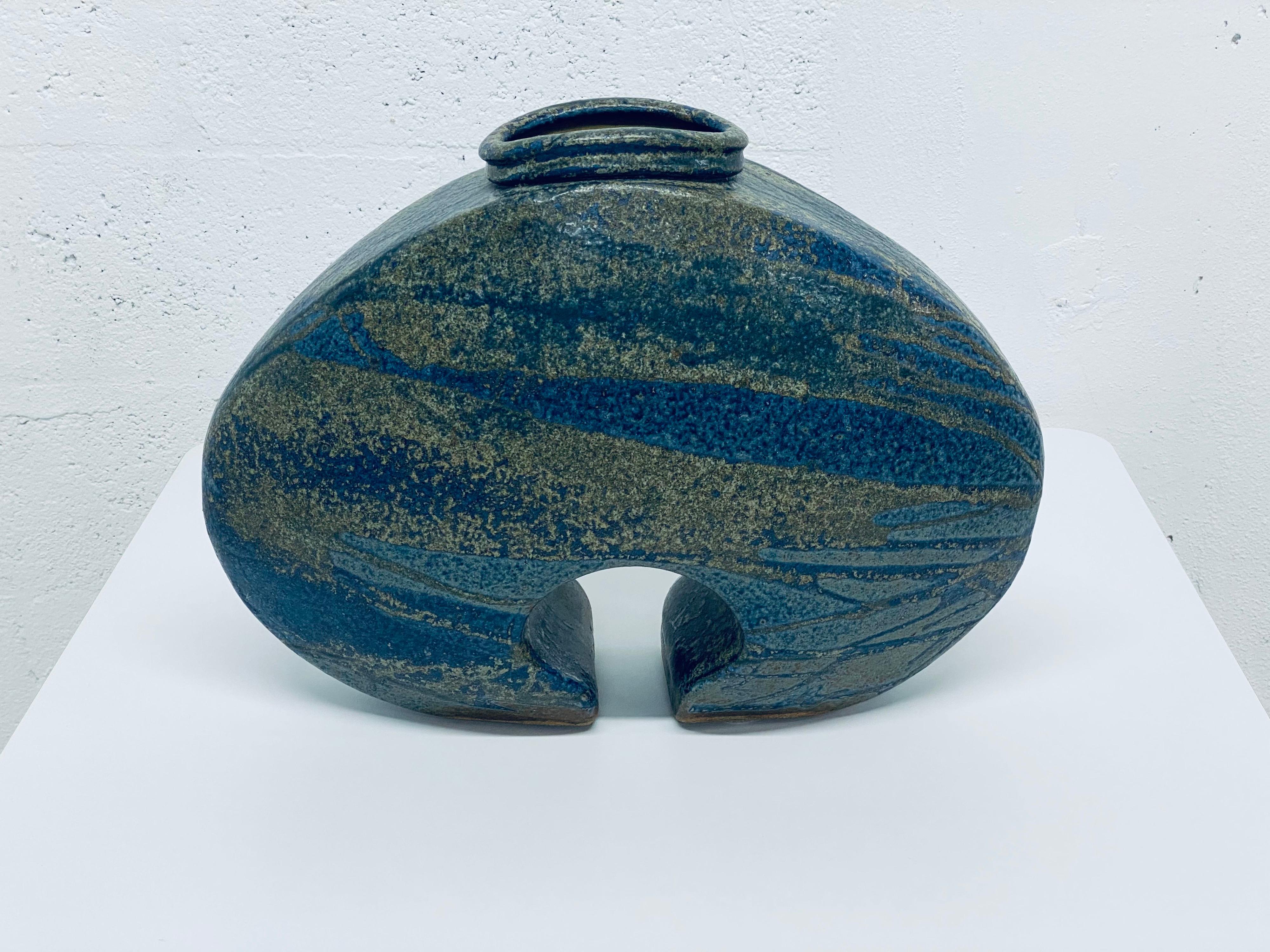 Studio pottery vase by Aleph Hammer with blue and tan marbleized effect from the 1970s; signed.