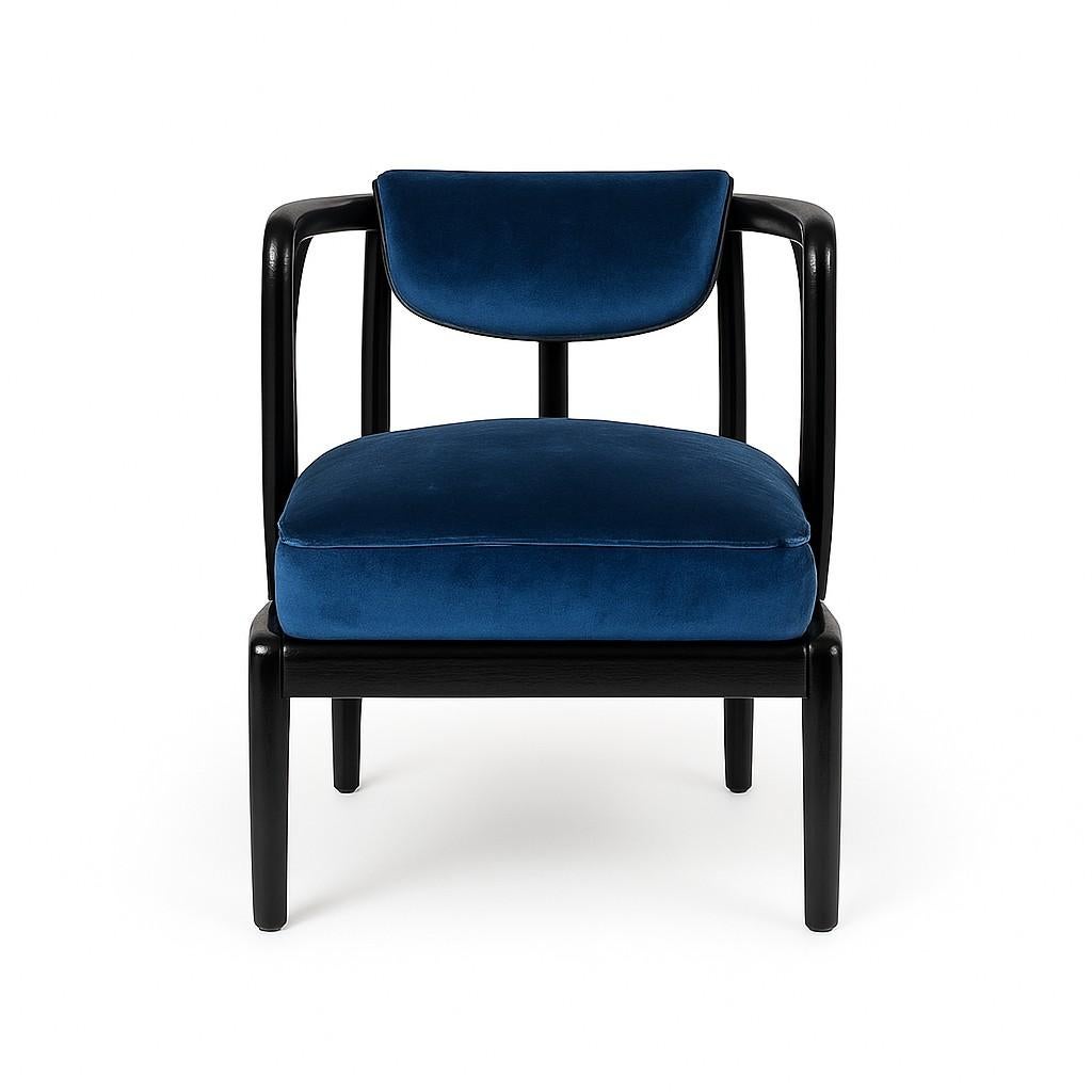 Contemporary with a refined mid-century nod, this accent chair embraces minimalist curves and soft geometry. Its clean silhouette and subtle detailing make it suitable for upscale interiors, boutique lounges, or modern hospitality