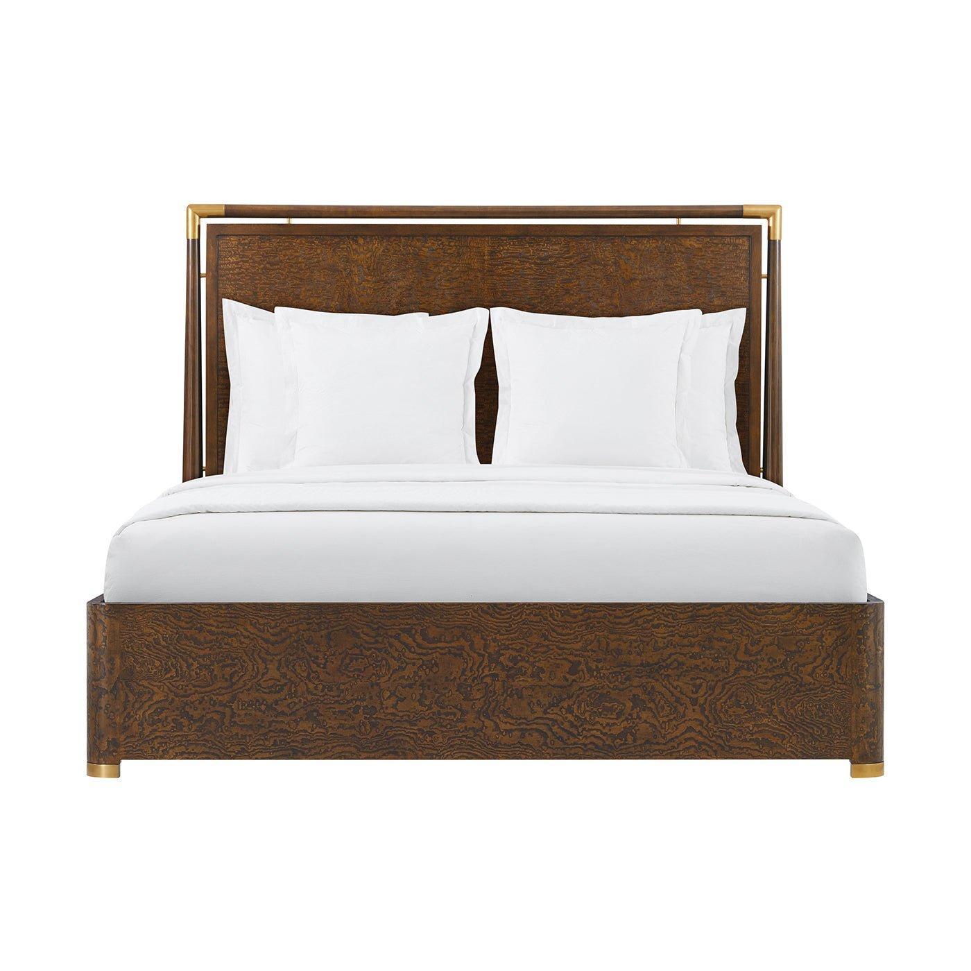 A masterpiece of design and craftsmanship. This stunning piece features graceful curves and a rich Tamo ash veneer, showcasing the beauty of natural wood in a sophisticated Pyramid Brown finish. The satin brass accents add a touch of luxury,