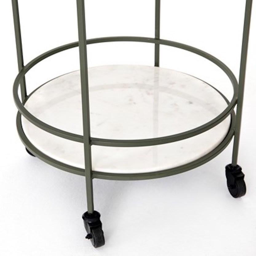 Midcentury style iron, glass, teak and marble circular bar cart on casters. Nice mellow Verte green finish.