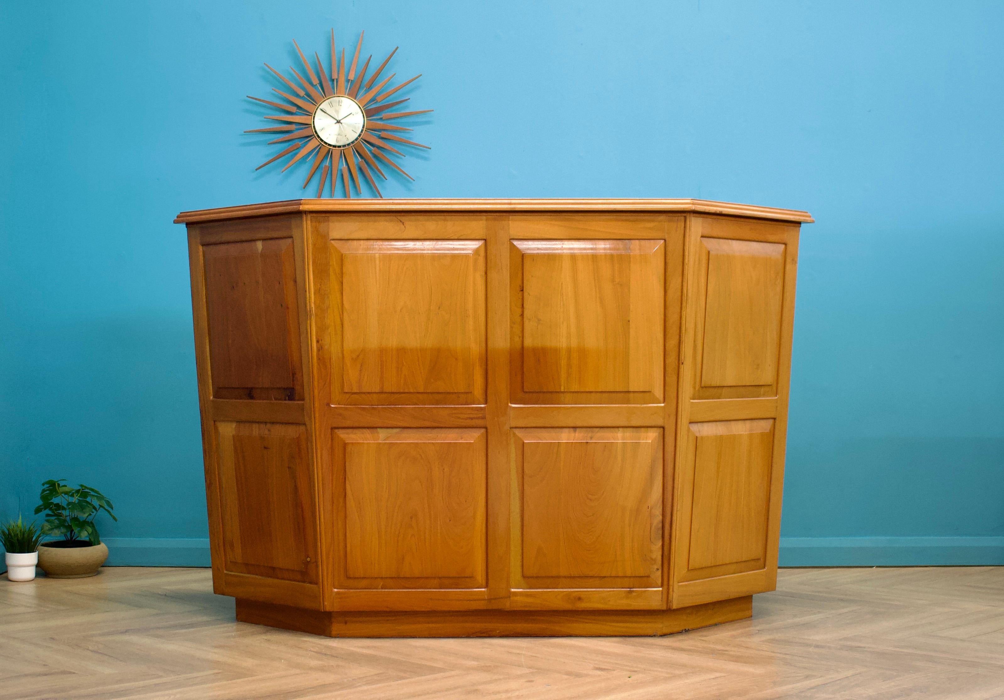 A stylish solid cherry large teak home bar - in the mid century style

It possibly started life off as a hostess station

Featuring a shelf and three lockable cupboards