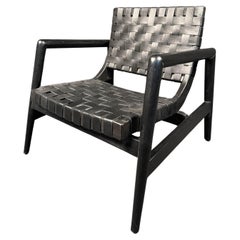 Fauteuil de salon en bois et cuir de style mi-siècle