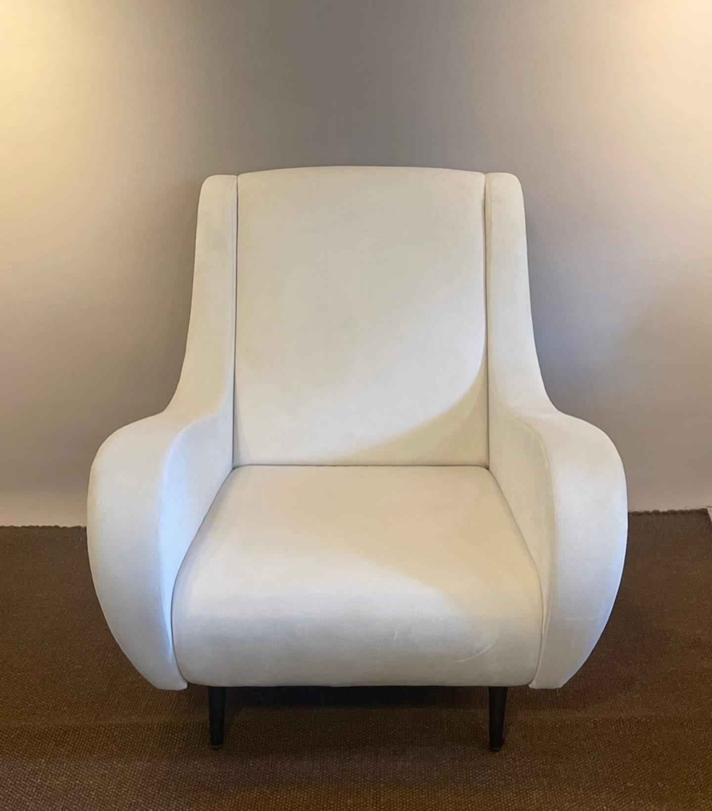 This lounge chair is a brand new and produced in Tokyo.
The upholstery fabric can be chosen from KINGHAM RELOADED made by CHIVASSO Italy. 
The ottoman is also available.