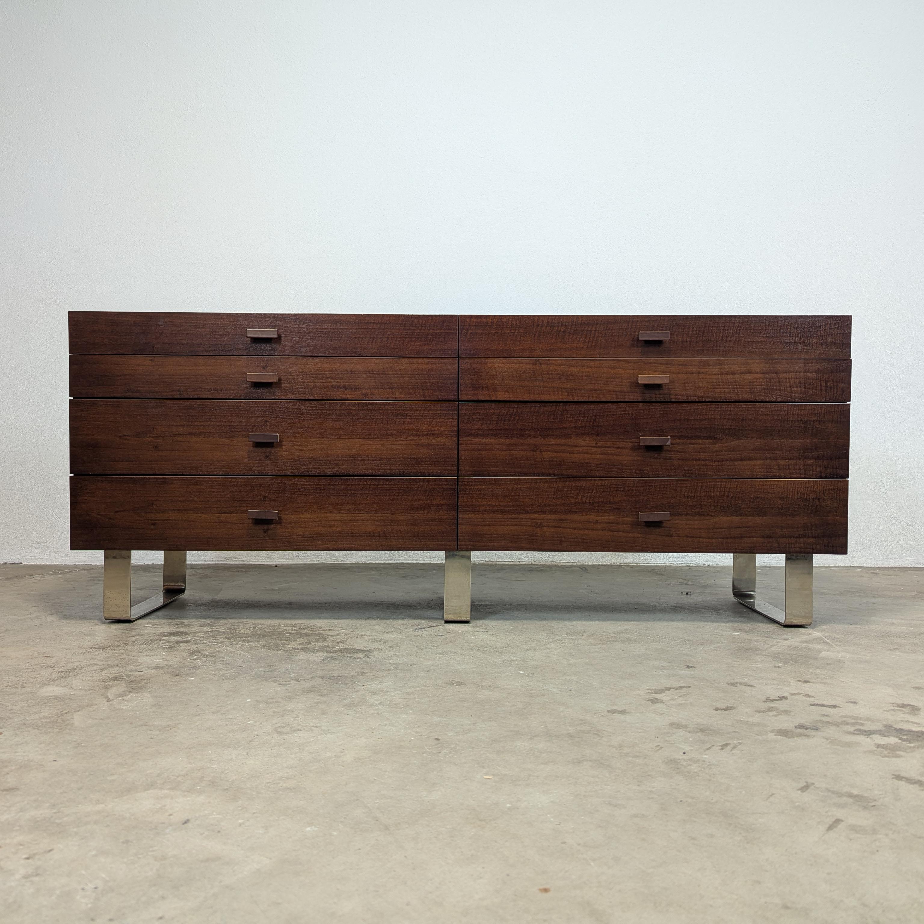 For sale is a stunning mid-century style lowboy dresser, believed to be a contemporary piece, measuring approximately 72