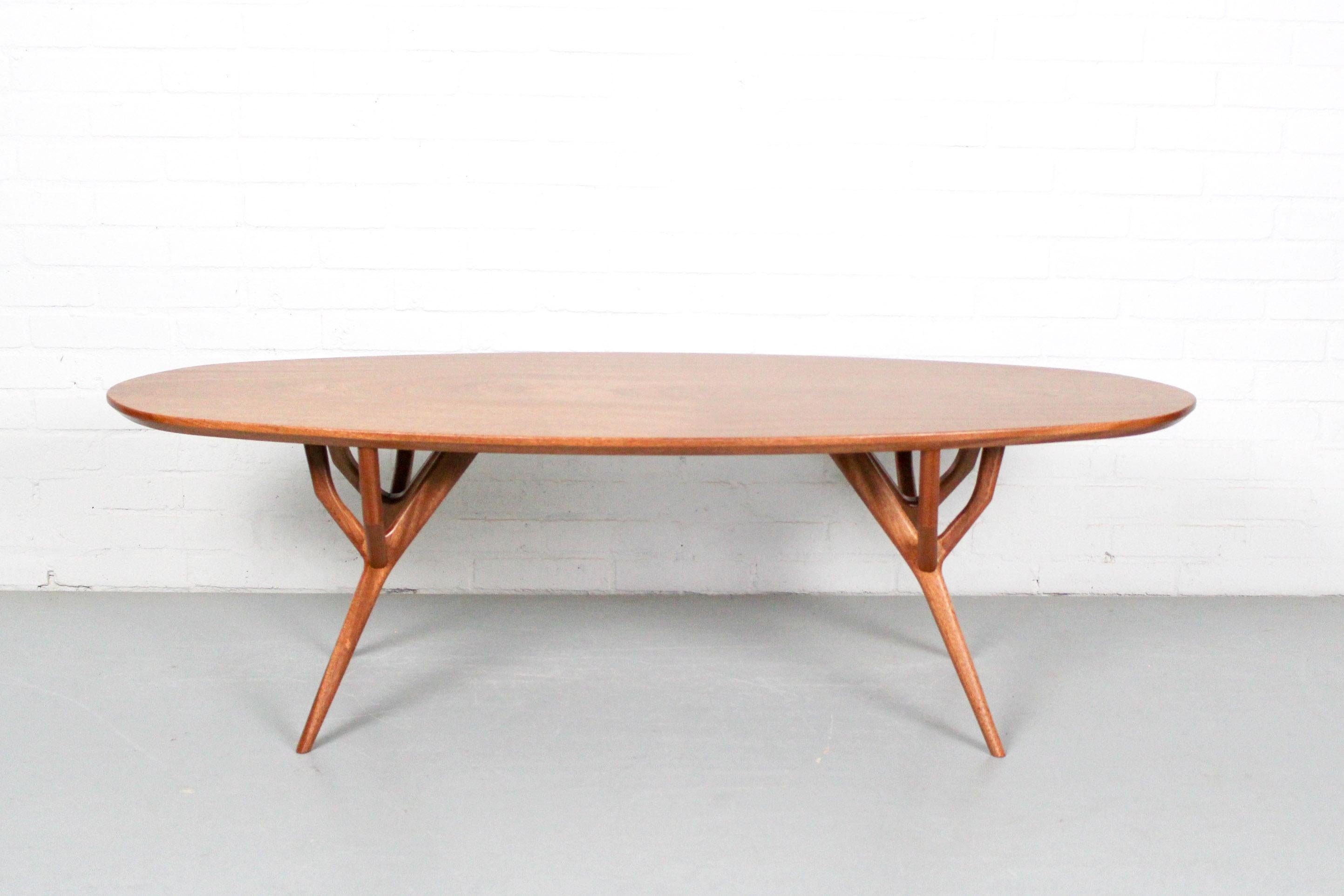New mahogany coffee table with beautiful organic shapes. In the style of Vladimir Kagan, shows great craftsmanships. One of a kind and absolutely stunning.