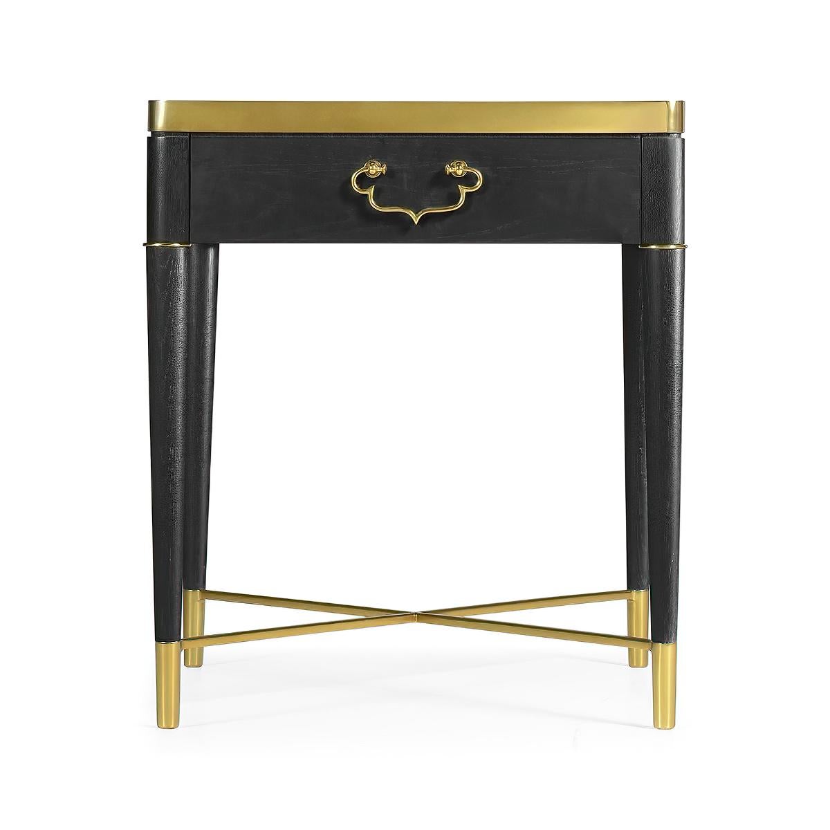 A French Mid-Century Modern style marble top lamp table with brass trim and hardware and an ebonized oak frame, with a single front drawer on turned and tapered legs joined by a brass X-stretcher.

Dimensions: 24