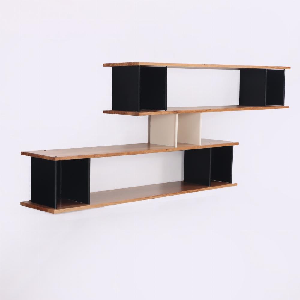 This wall-mounted, floating shelf in the style of French modern designers combines the warmth of oak with the sleek precision of aluminum, creating a striking balance of materials. Metal dividers and threaded rods connect and secure the oak planks,