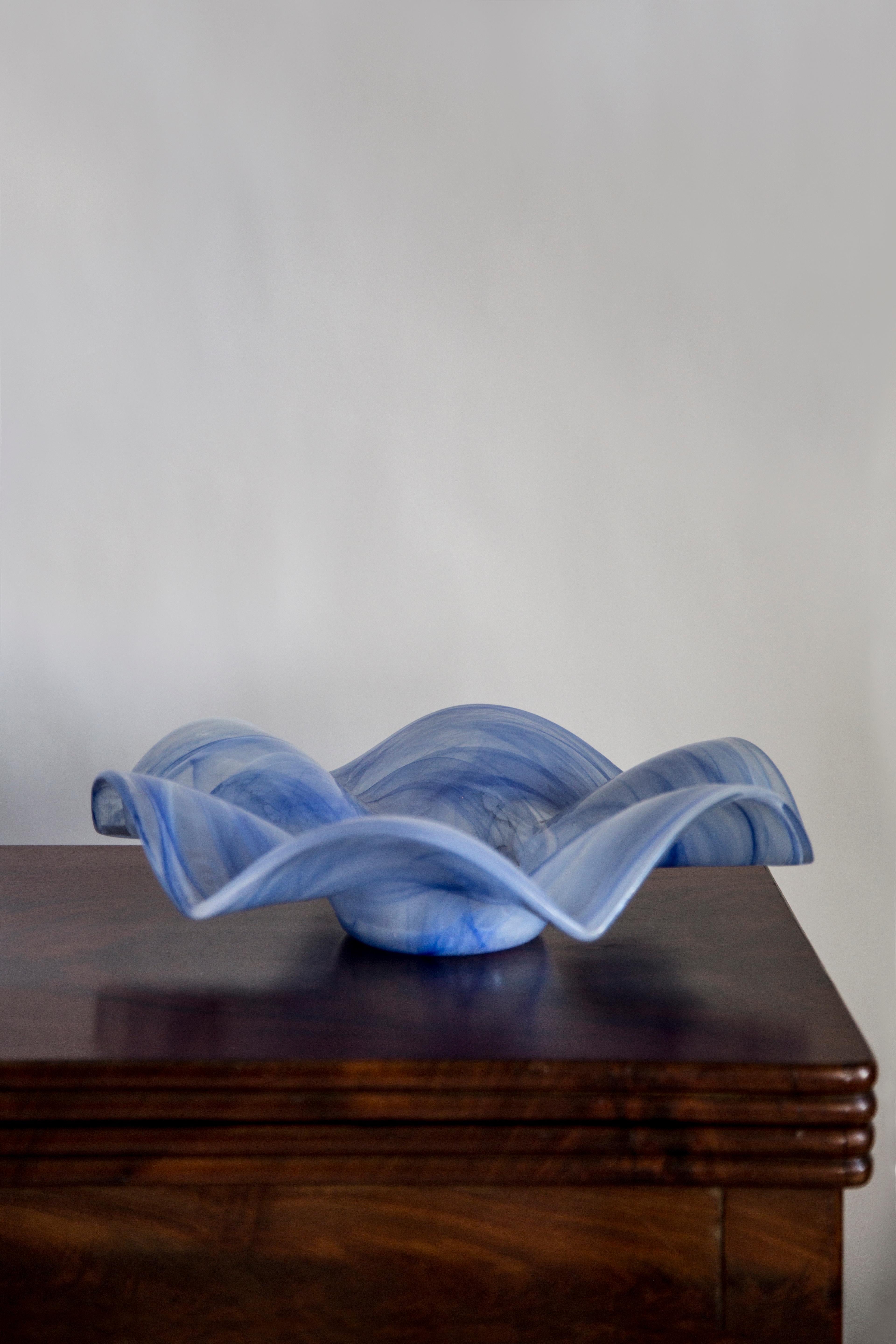 This original vintage glass element was designed and produced in the 2000s in Lombardia, Italy. It is made in Sommerso Technique and has a fantastic faceted form. The vibrant color makes this items highly decorative. This item is a high quality