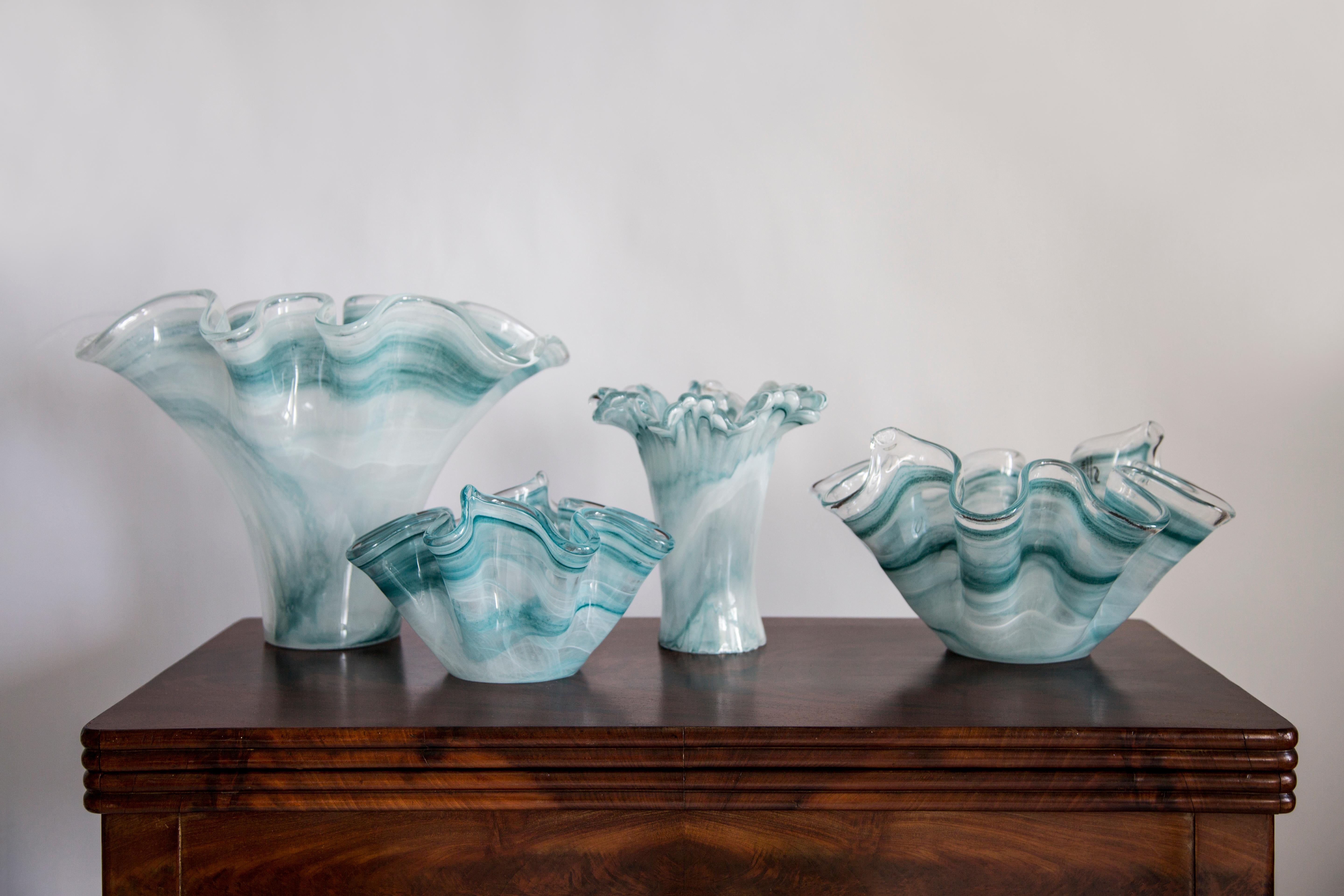 This original vintage glass element was designed and produced in the 2000s in Lombardia, Italy. It is made in Sommerso Technique and has a fantastic faceted form. The vibrant color makes this items highly decorative. This item is a high quality