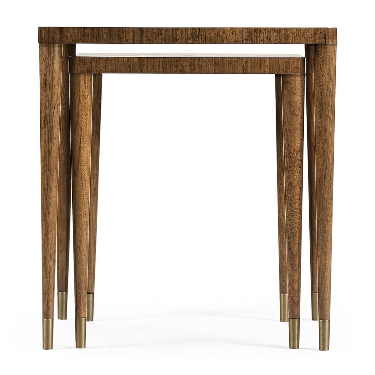 A Mid-Century Modern style nest of tables. The side tables are sculpted from American walnut with a hand-rubbed lacquer finish and brass ferrules. Hardware is acid dipped and hand-rubbed to achieve a rich, natural patina.

Dimensions

22