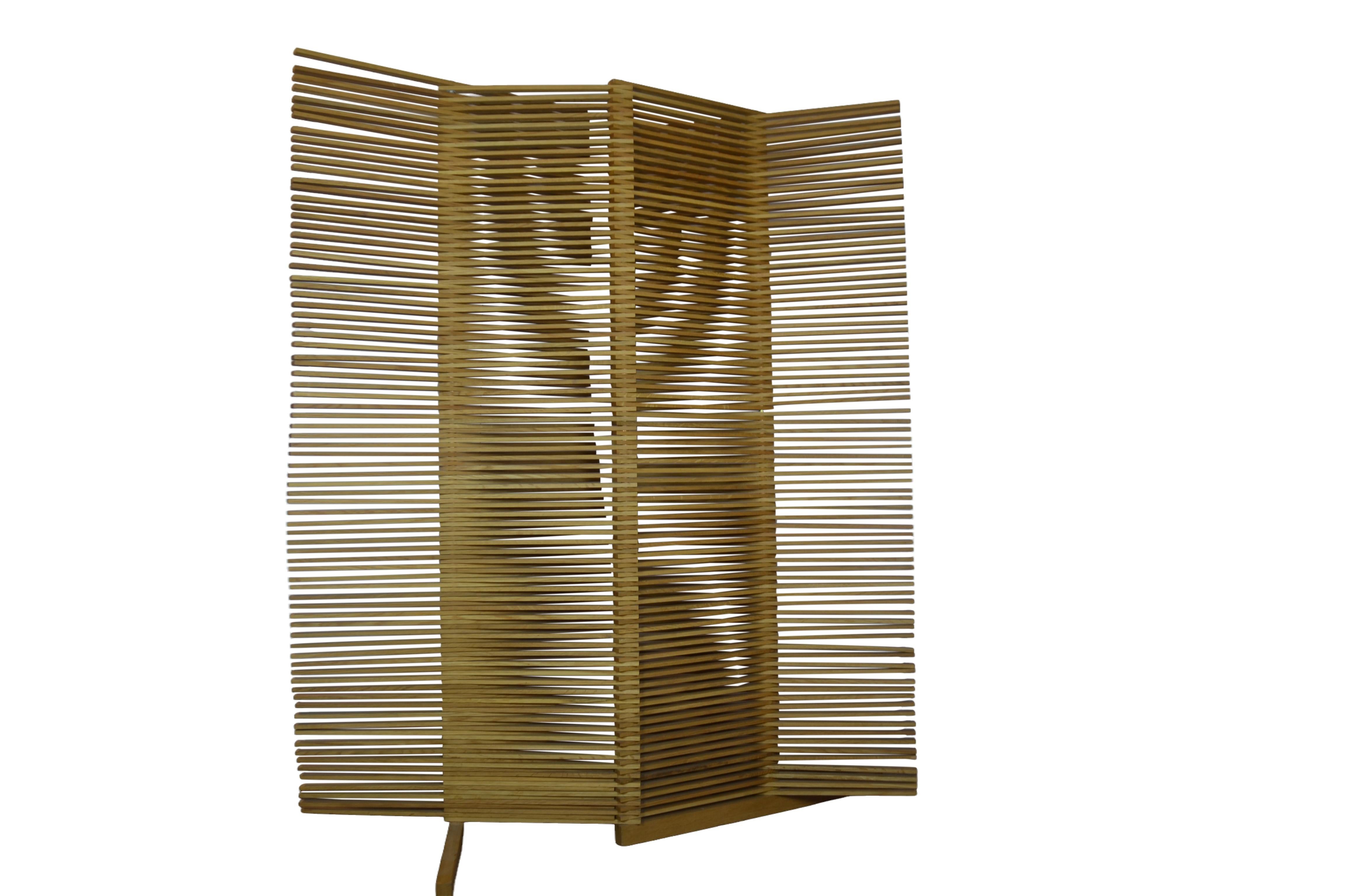 Mid-century style room divider made with wood. 
The wooden slats can be styled straight or curved.