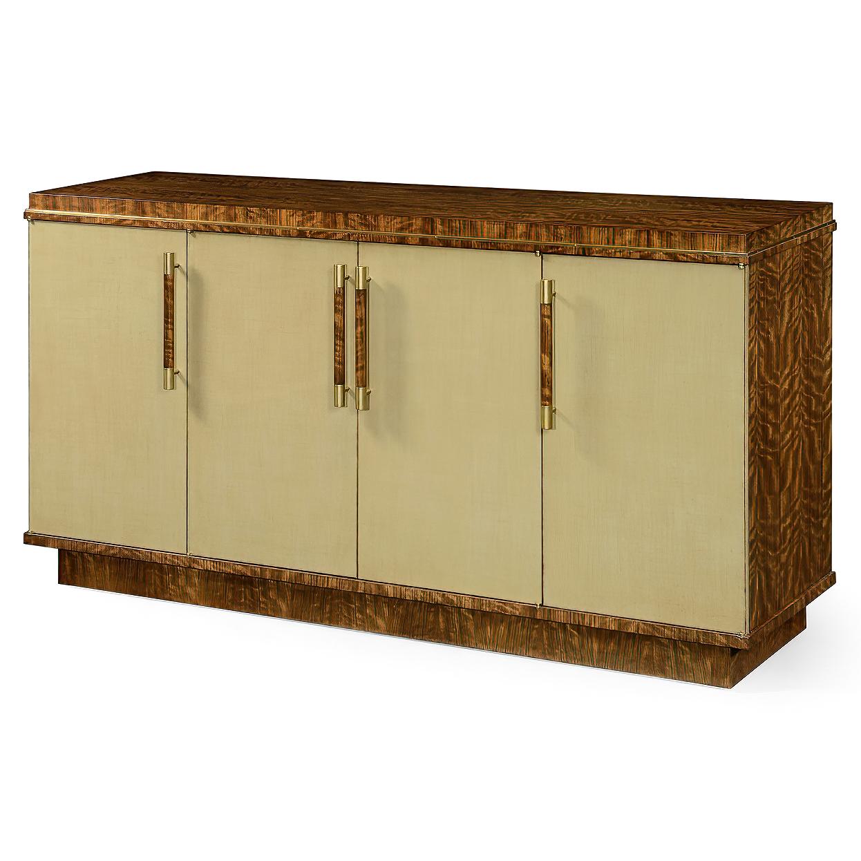 Mid-Century Modern style decorative veneered sideboard with brass details and four doors, strip handles and an internal fold-out serving slide. Celadon toned panels to the doors, fully veneered within.

Dimensions: 72