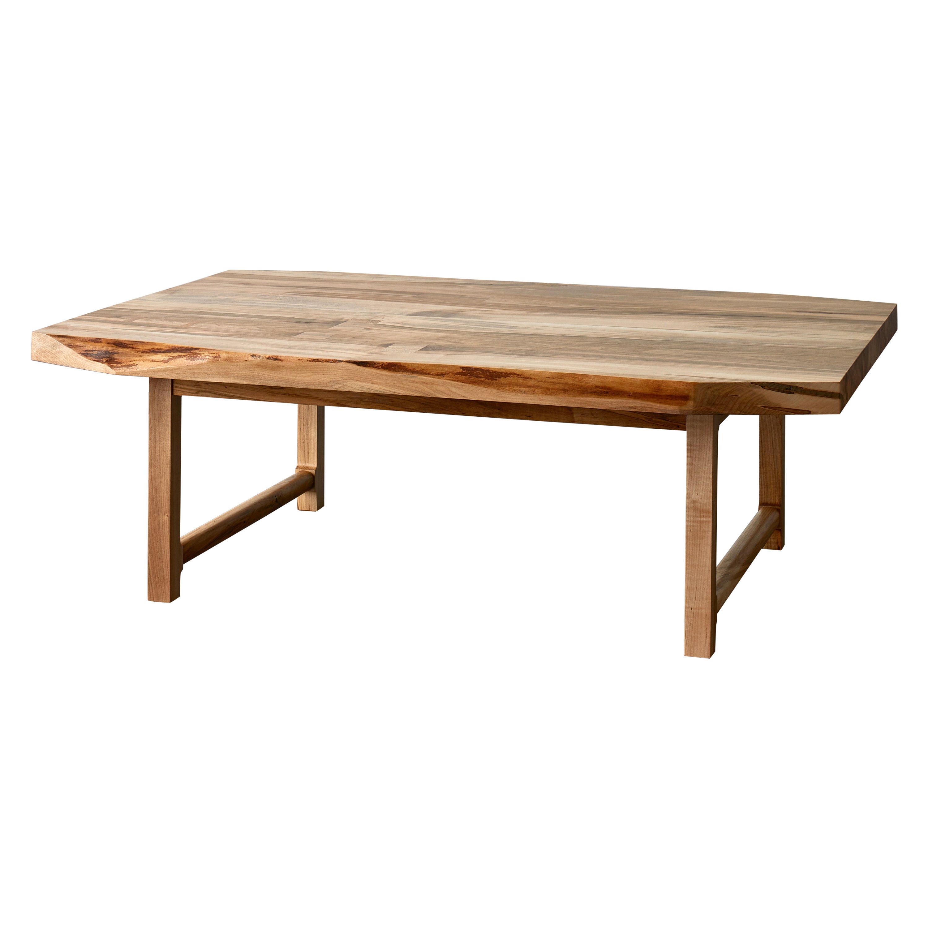 New York Heartwoods' contemporary spalted ambrosia maple Highland Coffee Table features a two piece wood top with faceted corners, patched knots, butterfly key inlays, and a hand-shaped Mid-Century design inspired base. Edges are left partially live
