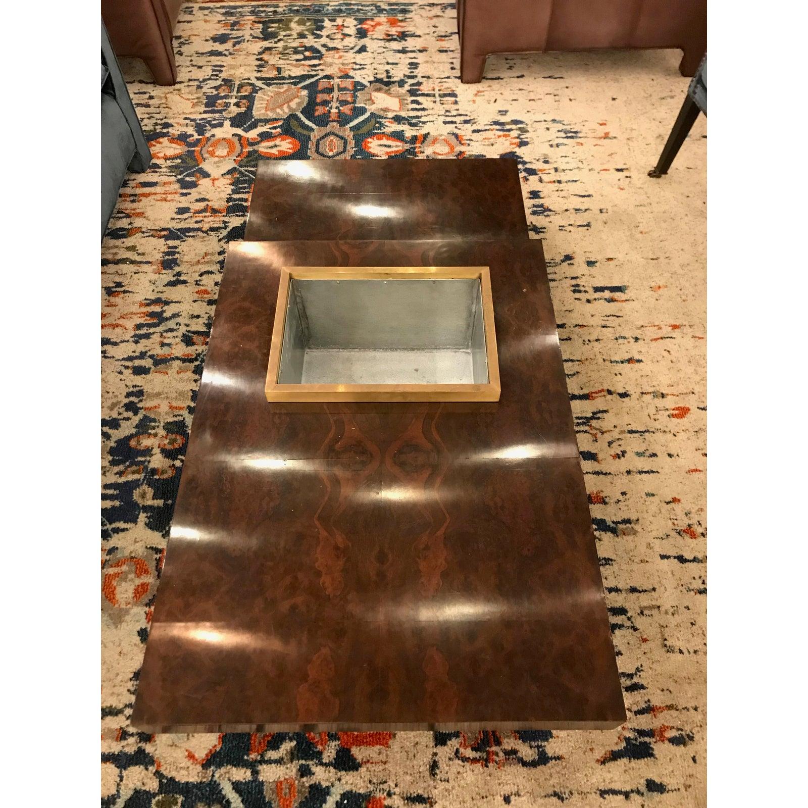 A beautiful Italian, midcentury burl wood coffee table with a dark satin finish. This rectangular coffee tables features a built in planter with a brass edge finish, and makes for a sleek and contemporary feel to any room. Custom designed by San