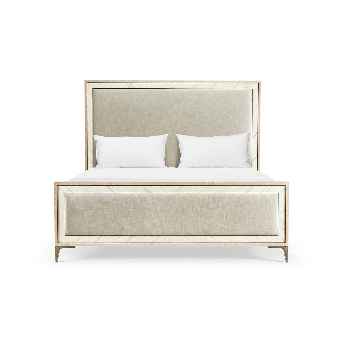 Midcentury style Tideline king size bed, this bone and linen upholstered bed is beautifully made from sustainably harvested materials with flawless craftsmanship. Performance linen upholstery compliments flush bone inlay framed with stainless steel