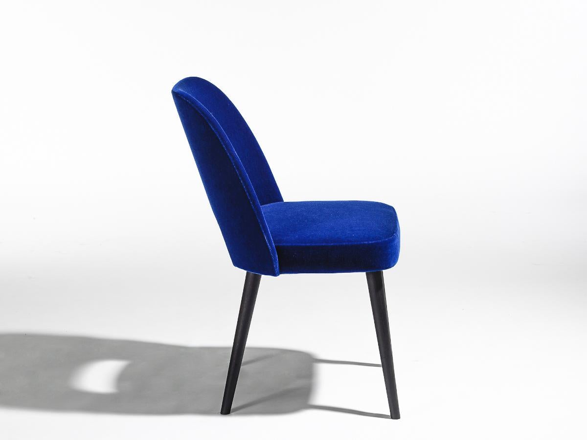 Mid-Century Modern style form with lacquered hardwood frame, upholstered with Kvadrat fabric. Back made of molded plywood covered with foam and Molino, seat with cold foam and fleece. Chair legs with universal glides.
Dimensions: 400 mm, seat width