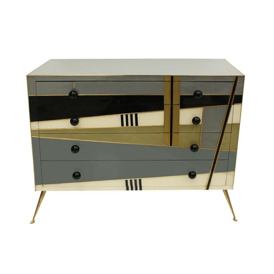Contemporary commode designed by L.A. Studio. Composed of four drawers with solid wood structure covered in Murano glass. Italian manufacture.

 