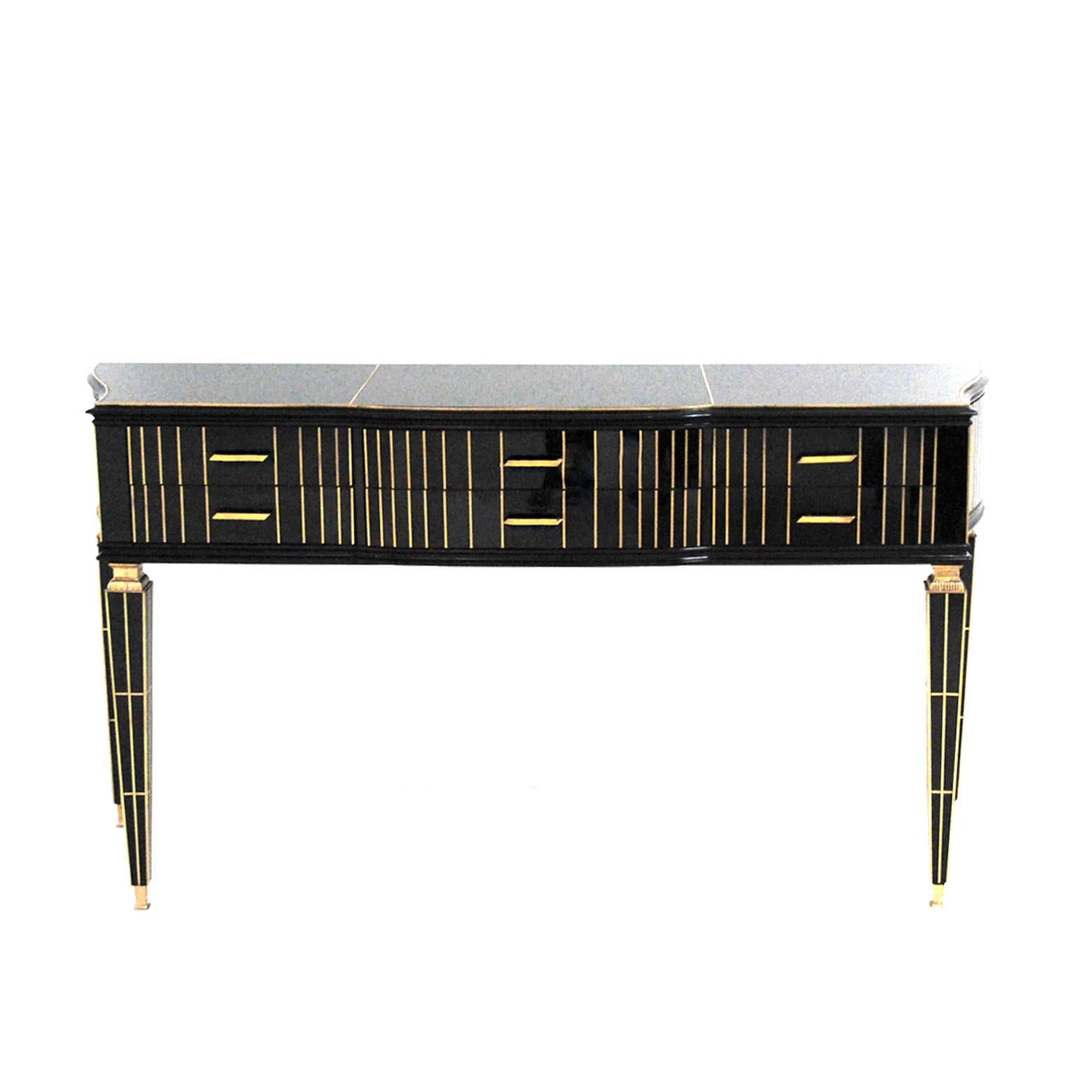 Contemporary Italian commode composed of six drawers, with structure made of solid wood covered in black Murano glass and brass details.

Our main target is customer satisfaction, so we include in the price for this item professional and custom made