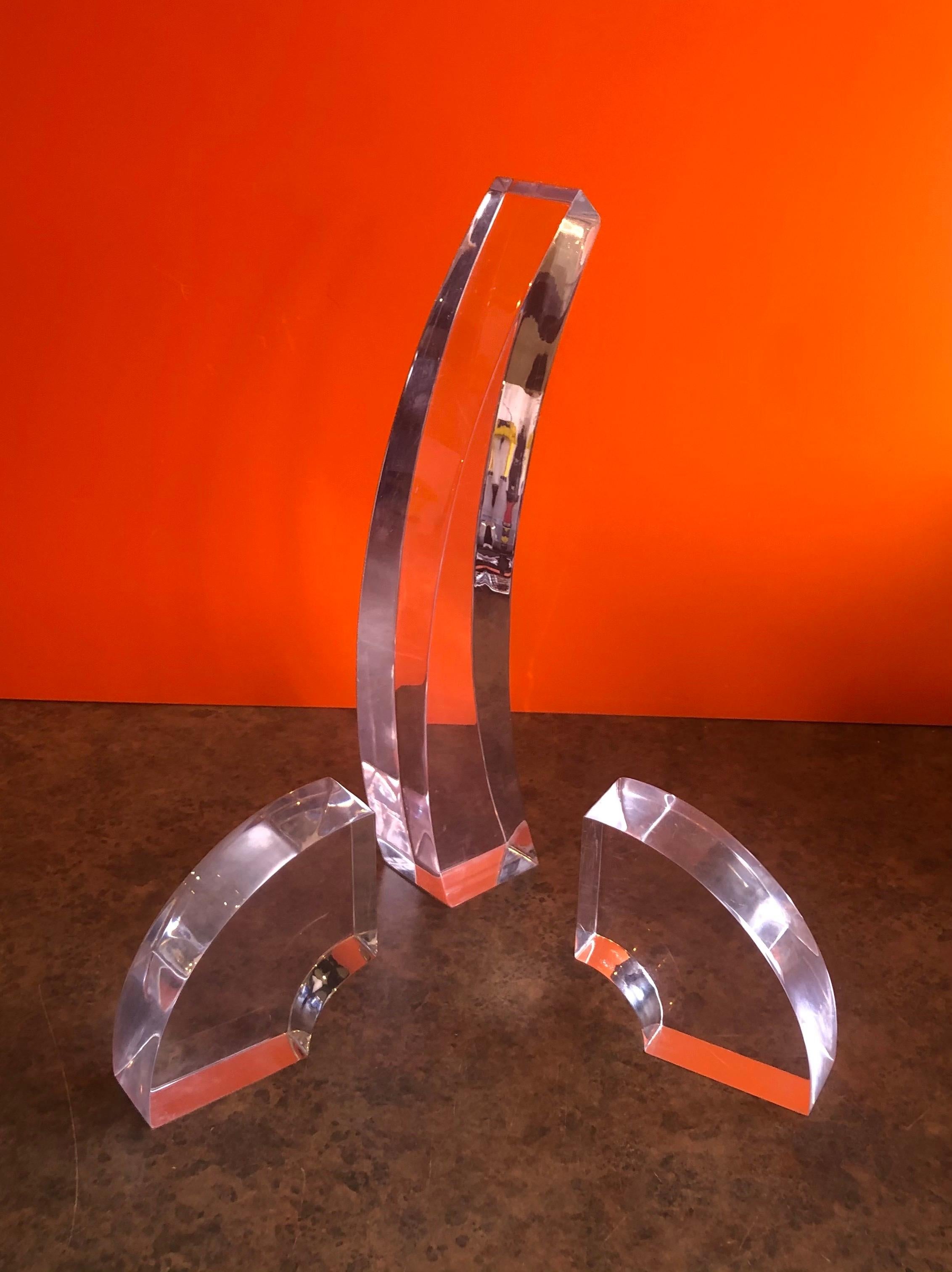 Large midcentury stylized Lucite three-piece phallic sculpture, circa 1970s. The sculpture is made of three pieces of Lucite and can be configured in a number of different ways. The sculpture is unsigned and in very good vintage condition. Measures: