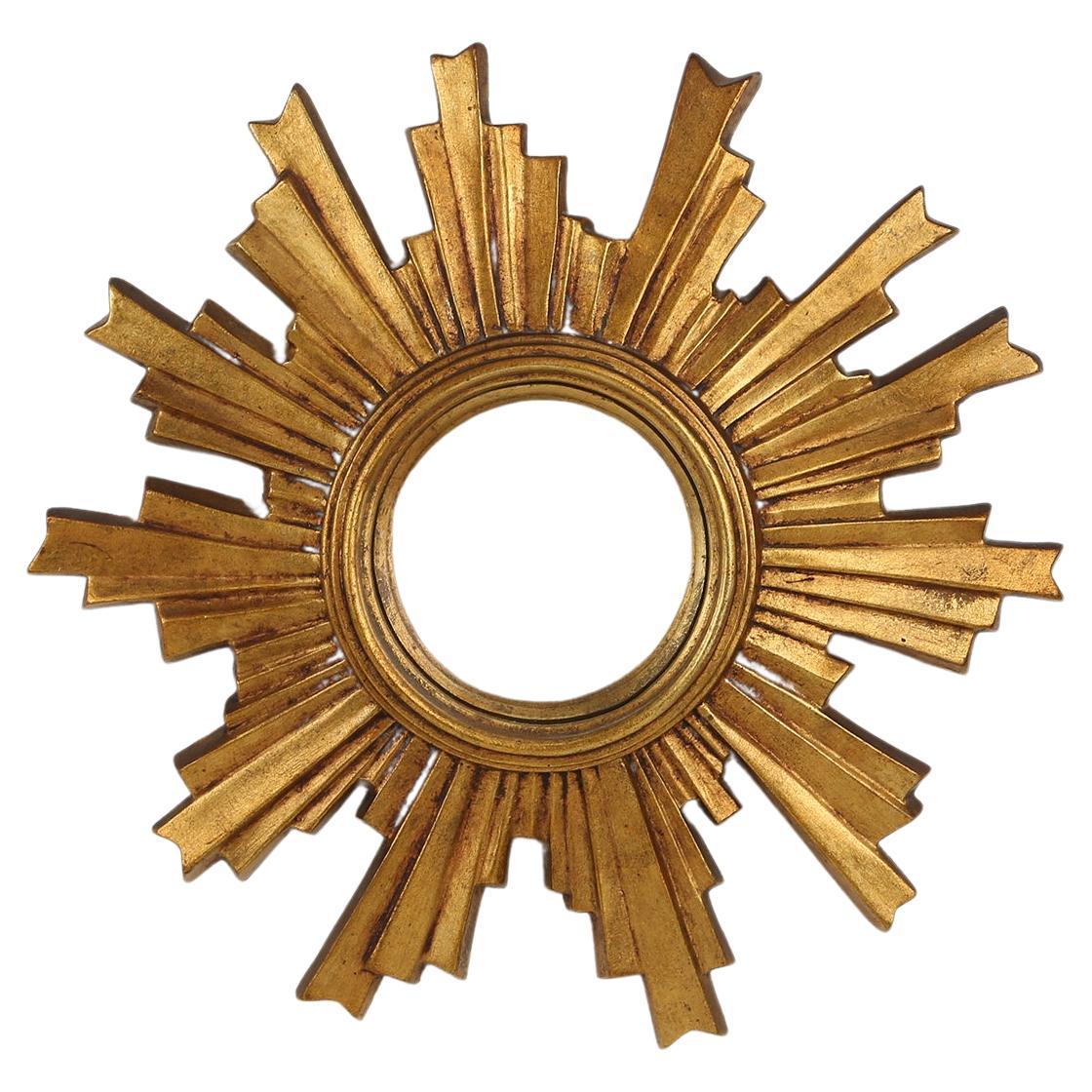 Golden sun mirror made around 1960.