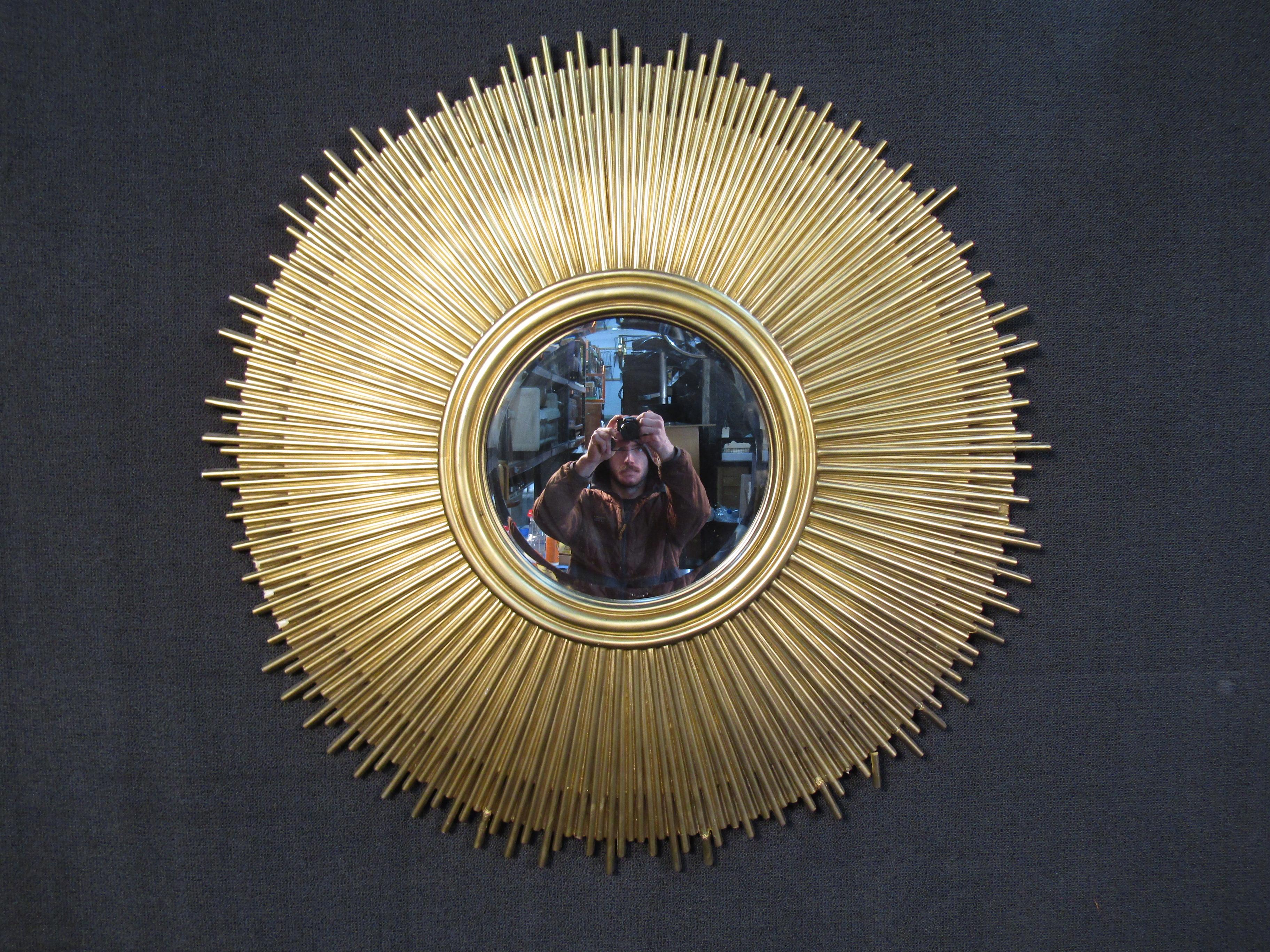 This mid-century sunburst mirror is a great piece of vintage decor for any space. Please confirm item location with seller (NY/NJ).