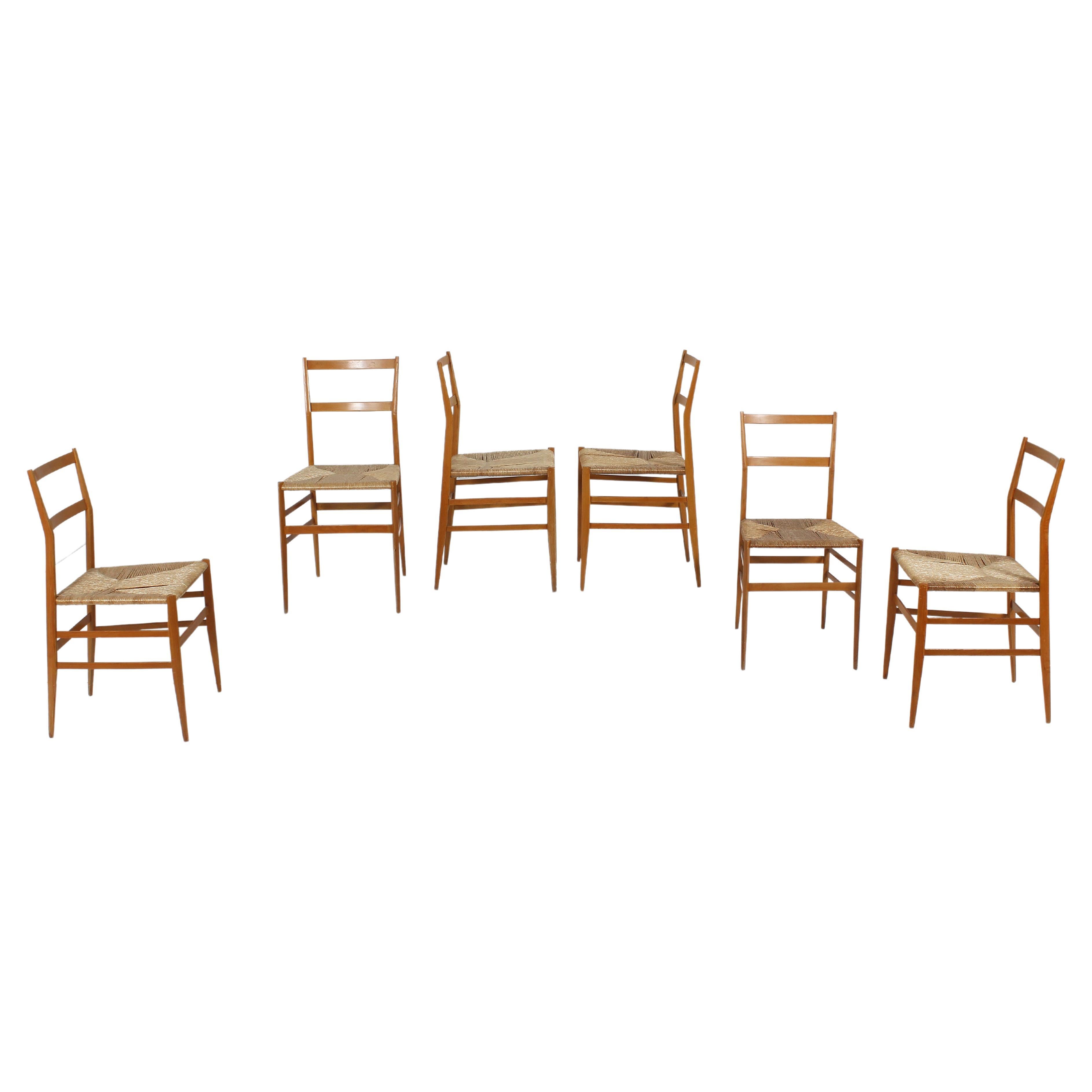 Rare and prestigious set of six chairs model 