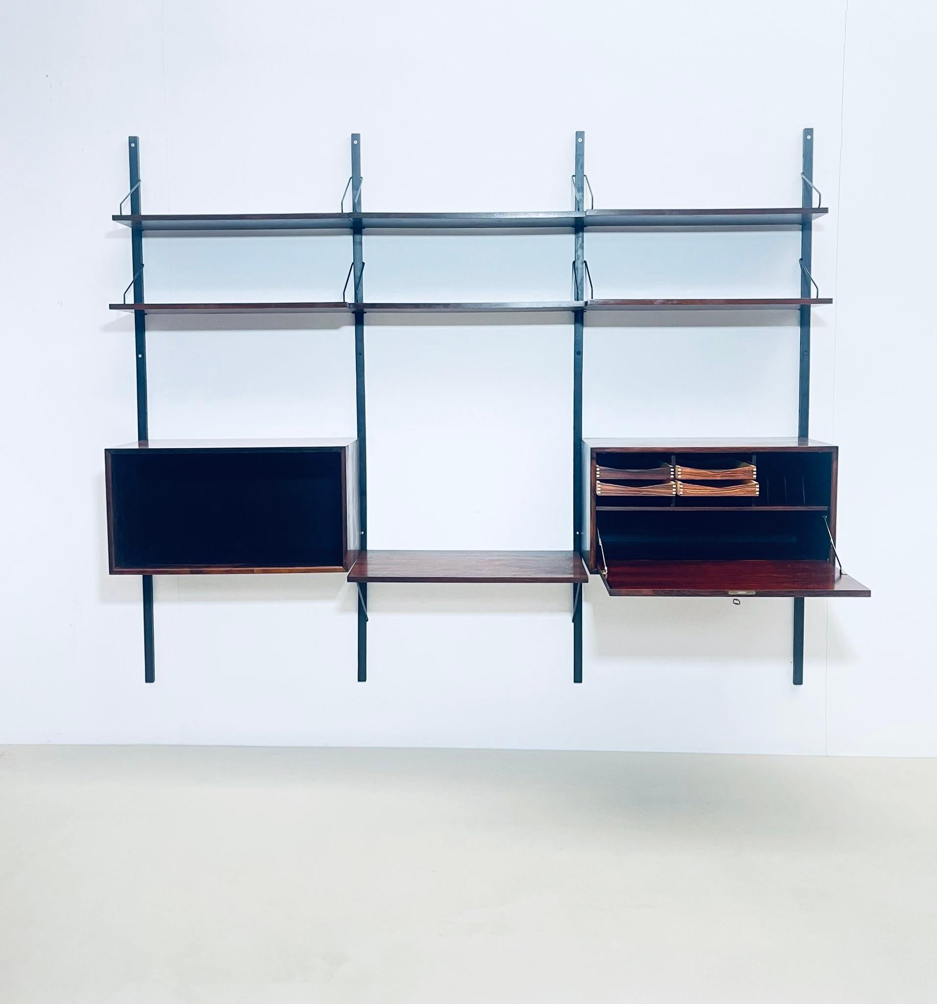 Mid-century suspended wooden wall unit by Poul Cadovius - Denmark 1960s.