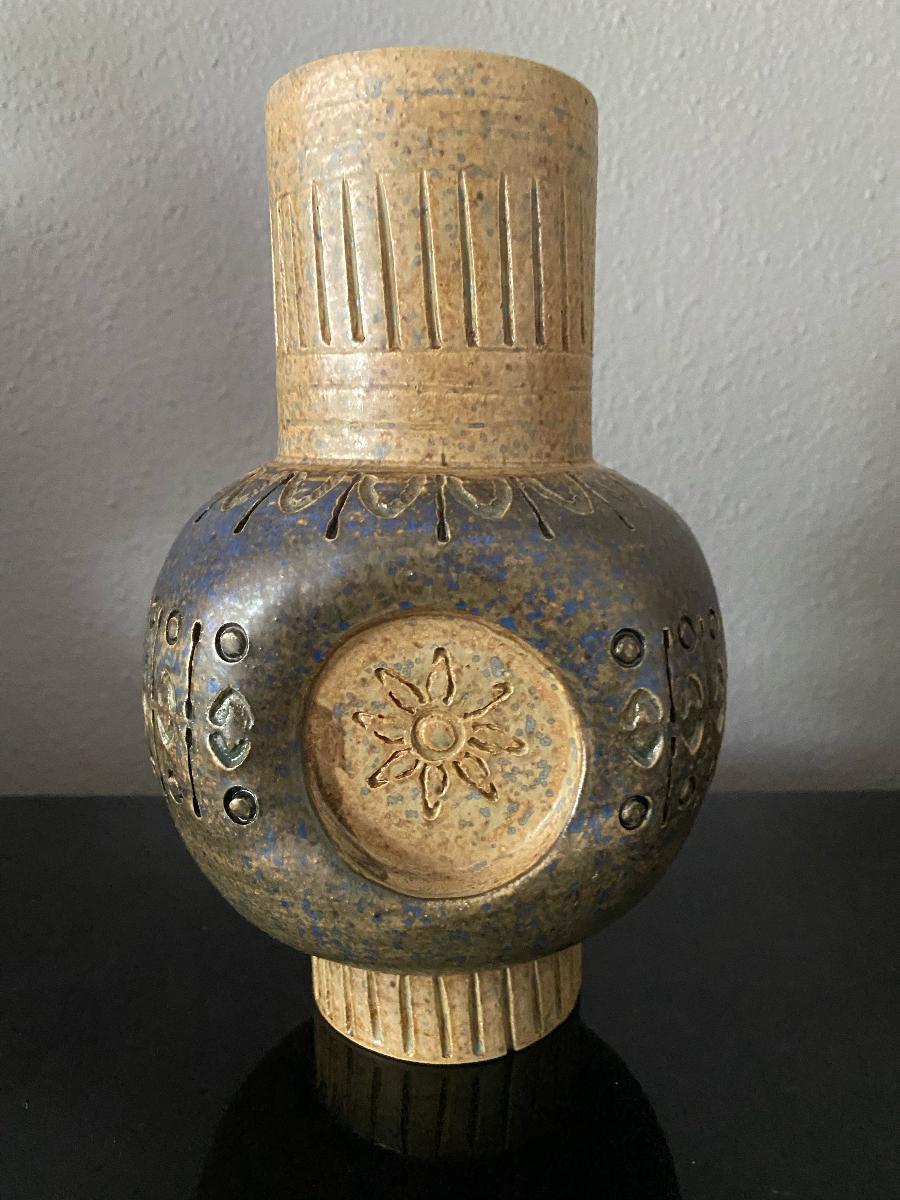 Beautiful hand carved vase with graphic pattern. Stamped and signed under base.