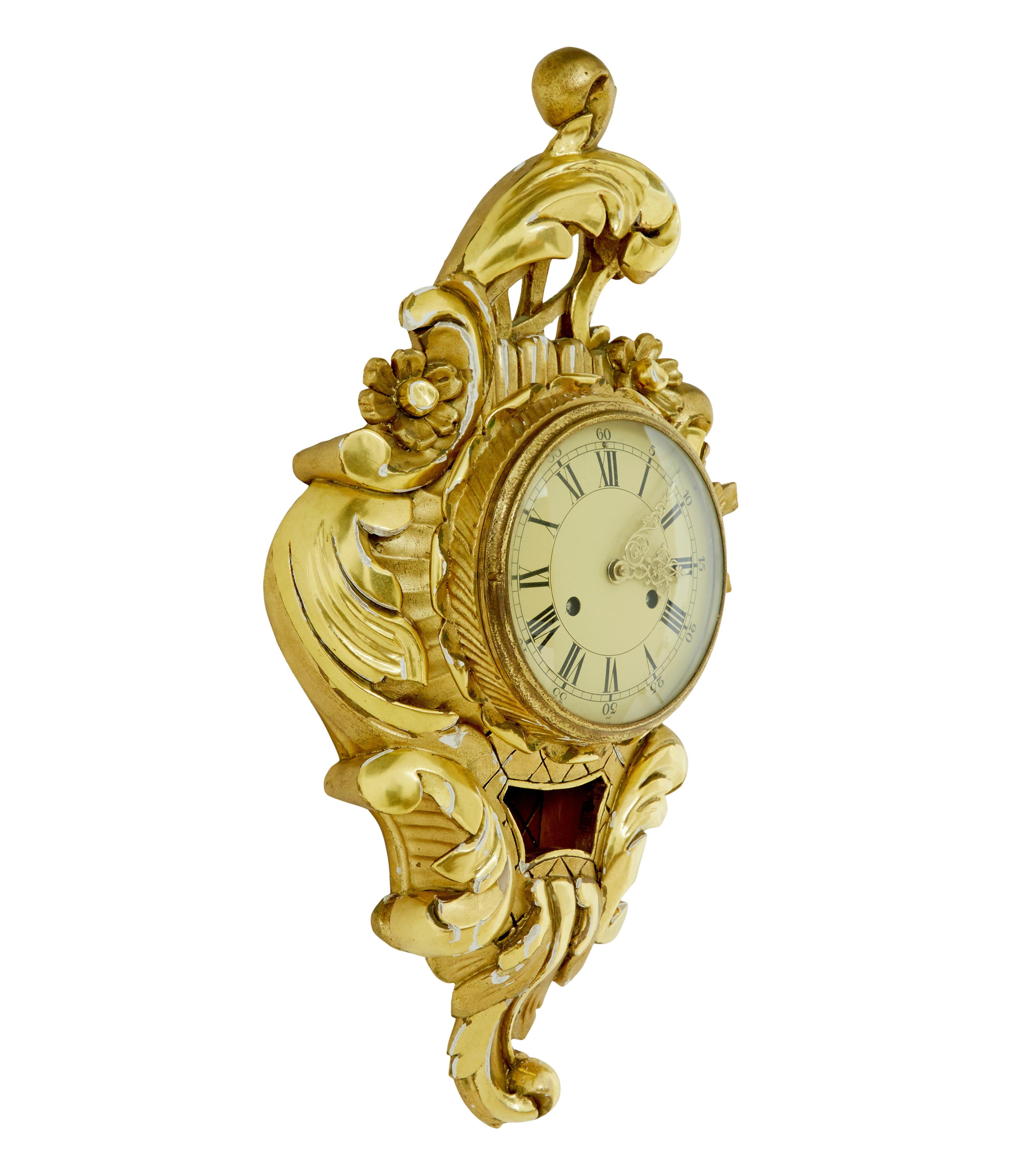Mid century rococo revival gilt clock by Westerstrand circa 1950.

Good quality rococo influenced clock by well known swedish maker westerstrand.

Fitted with a twin train 8 day movement and original pendulum.  Enamel clock face with roman numerals
