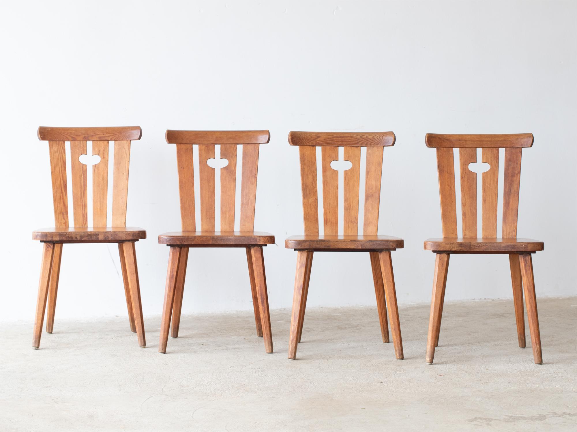 A set of four mid-century pine dining chairs by Göran Malmvall. Swedish, c. 1960s.

Stock ref. #2222

Sturdy frames with light cosmetic wear.

80.5 x 45.5 x 43.5 cm (31.7 x 17.9 x 17.1 