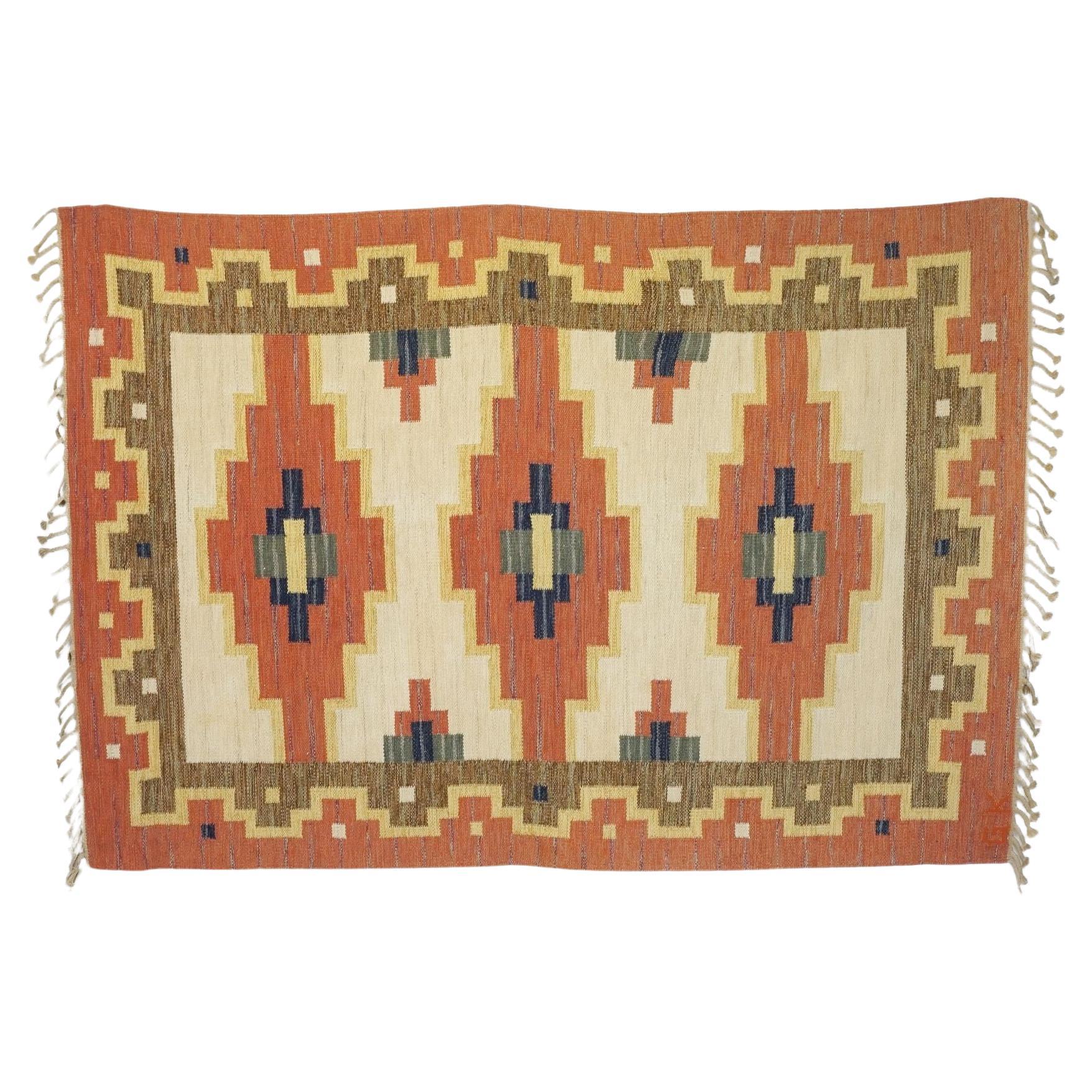 Mid-Century Swedish Kilim in Tones of Red and Cream For Sale