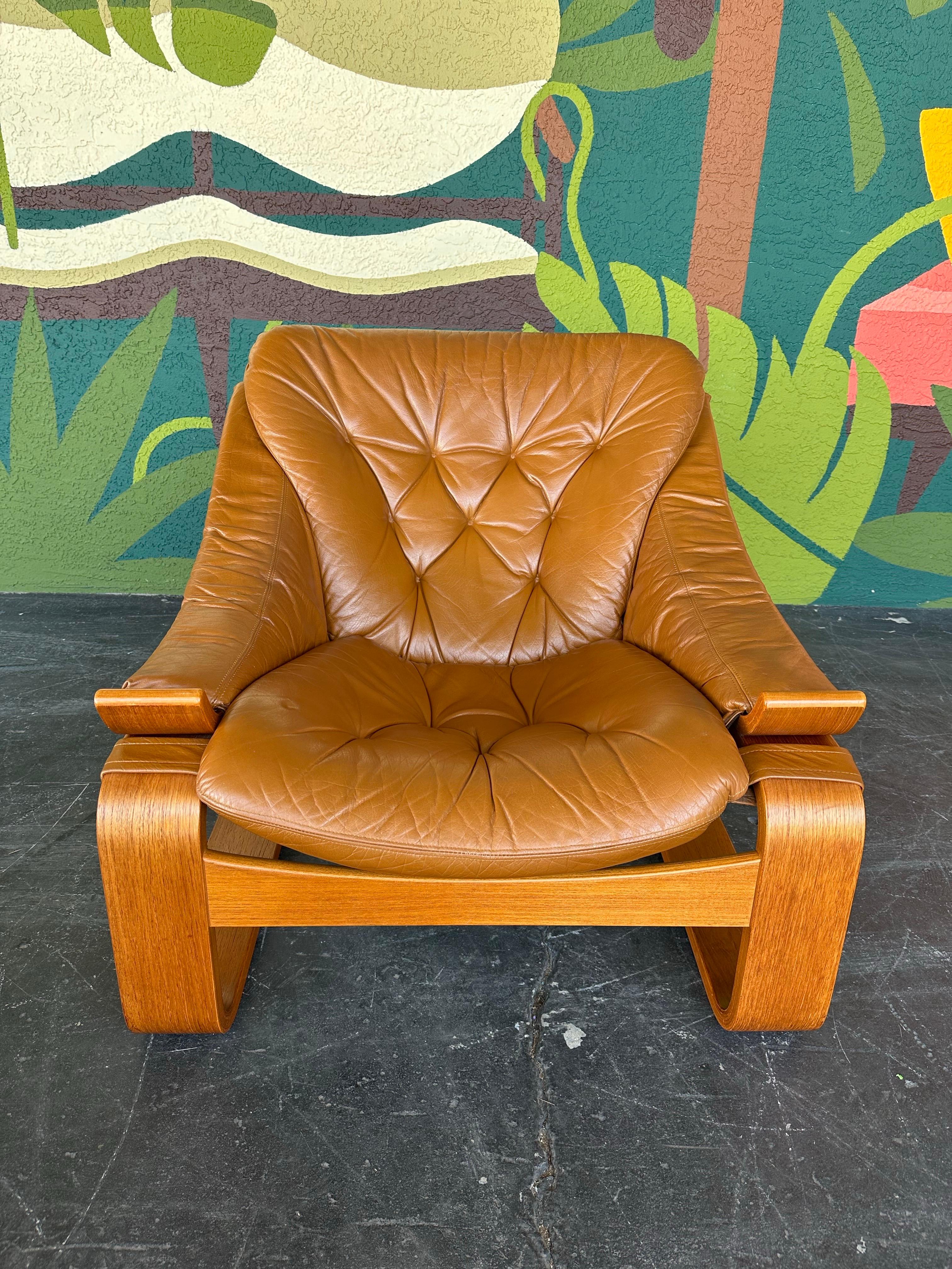Mid Century Swedish Kroken Teak and Caramel Leather Lounge and Ottoman Set In Good Condition In Lutz, FL