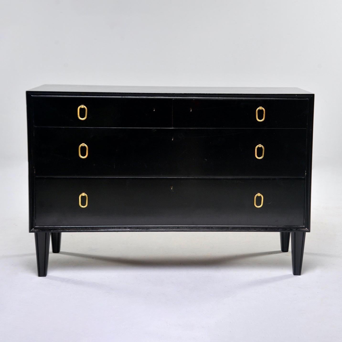 Four-drawer mahogany bachelor’s chest by Swedish maker AB Svenska Mobelfabrikerna Bodafors has a newly applied ebonized finish and the original brass hardware, circa 1960s. Drawers have dovetail construction. Very good overall vintage